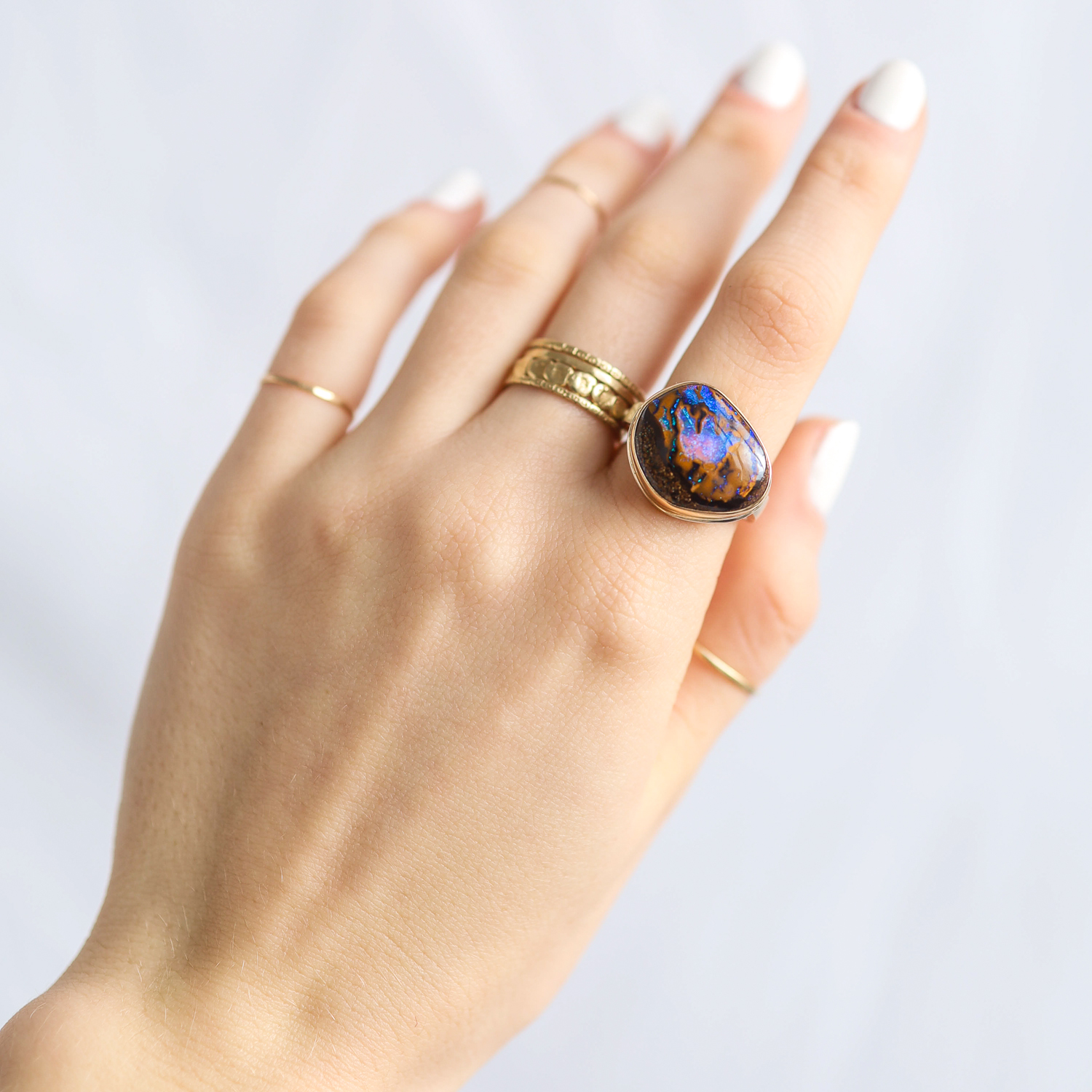 Jamie Joseph: Ring, Asymmetrical, 14K gold bezel set Koroit boulder opal, Sterling silver soft live edge band, Stone measures 5/8 x 3/4, Currently available in size 6 1/2