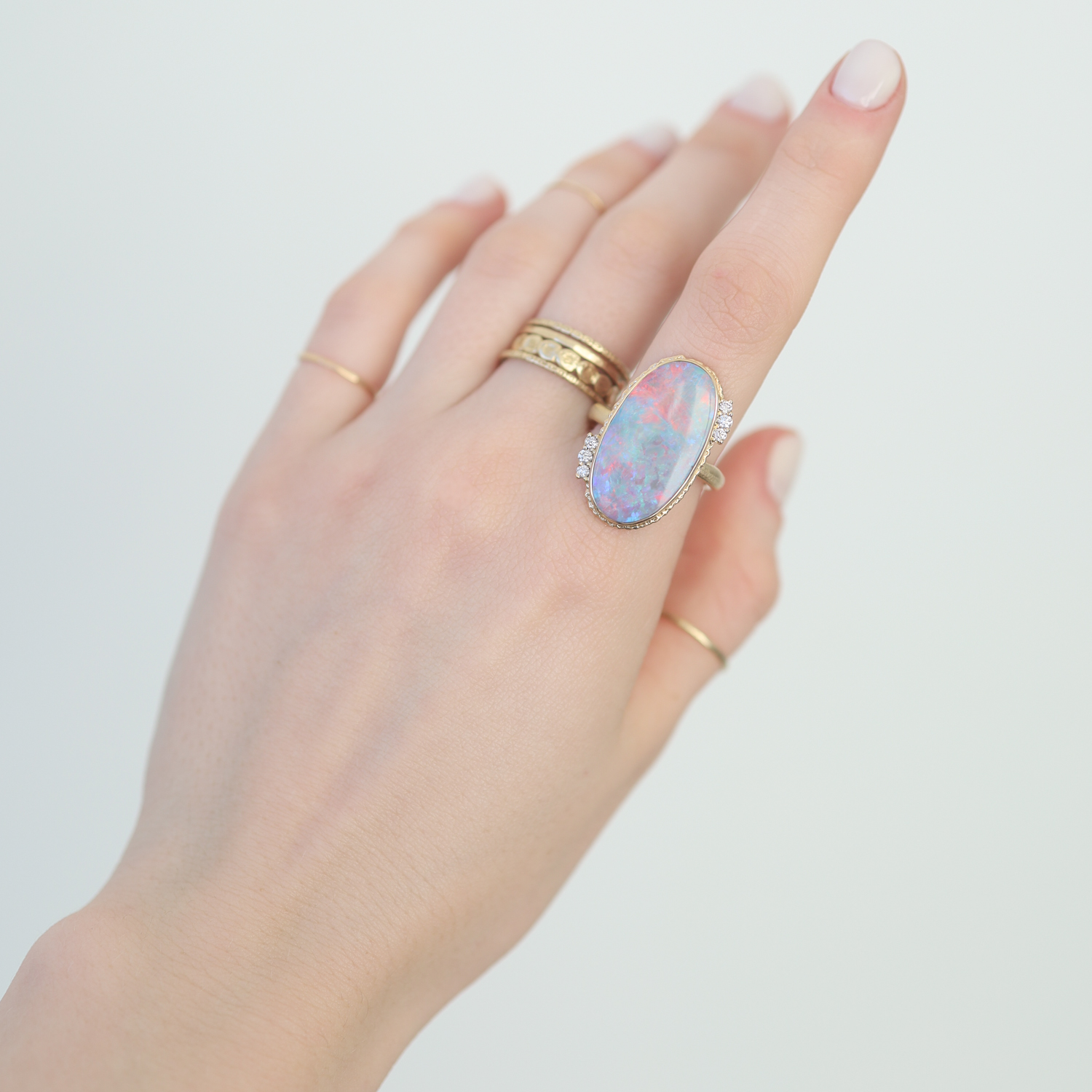Jamie Joseph: 14K gold ring ,Australian Opal with 6 satellite diamonds,.16tcw,Ruffled platform middle organic band,,sz 8, Measures 1 x 1/2