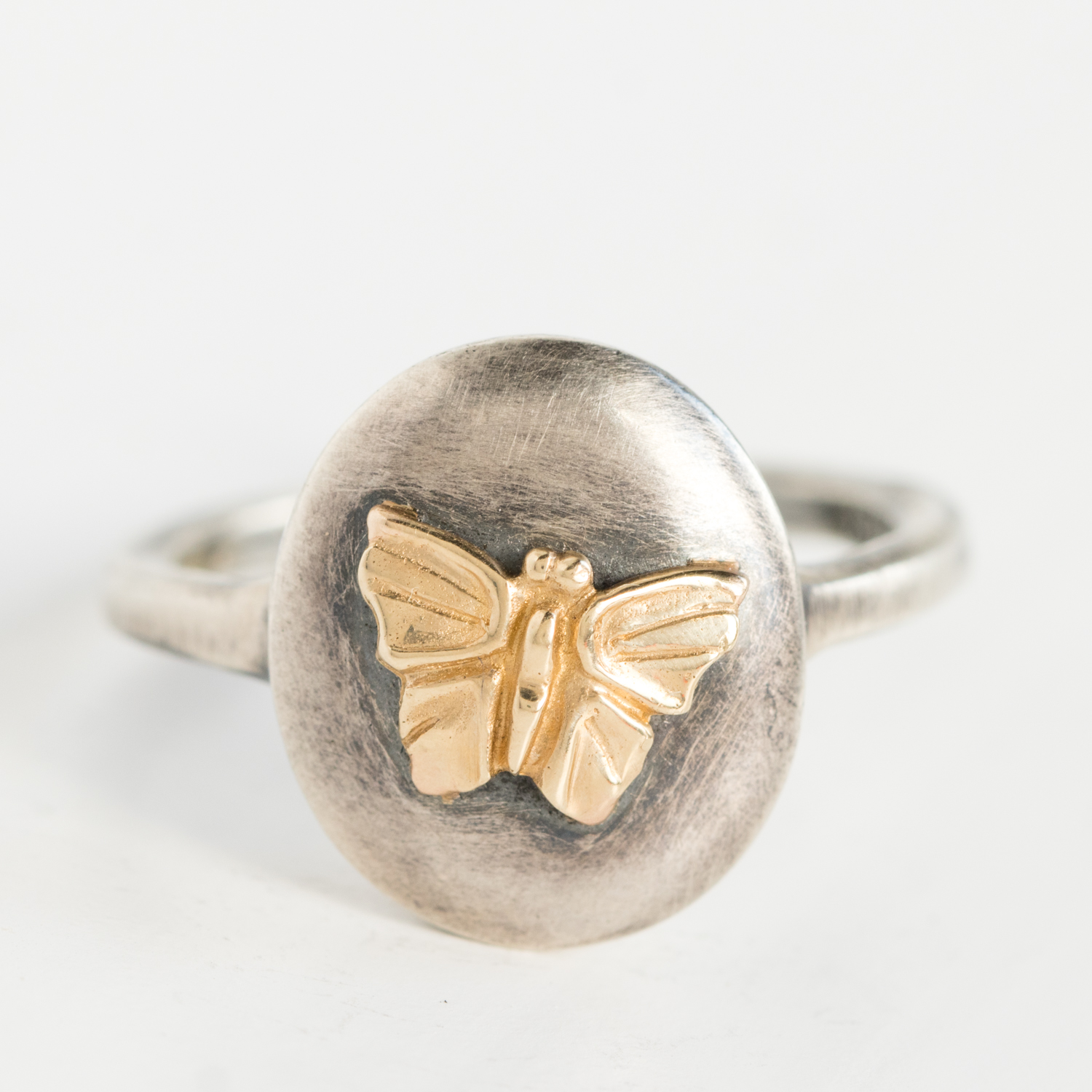 Jamie Joseph Trunk Show:Sterling & 14K Gold Ring w/ Butterfly on Small Oval Open Back Platform w/ Hidden 0.025 ct Pink Sapphire Flower Charm