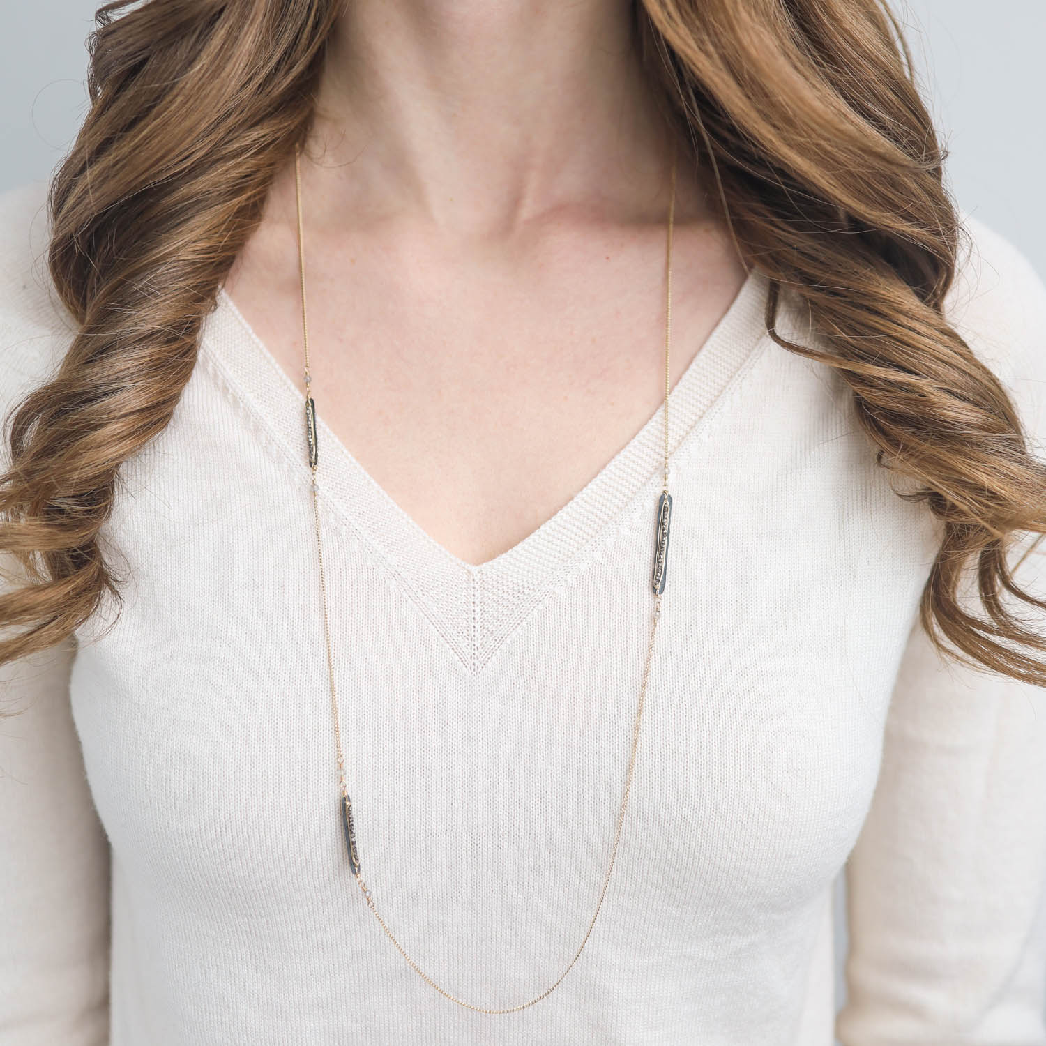 Dana Kellin: Necklace, 3 pyrite bar stations, Gold fill, Labradorite.