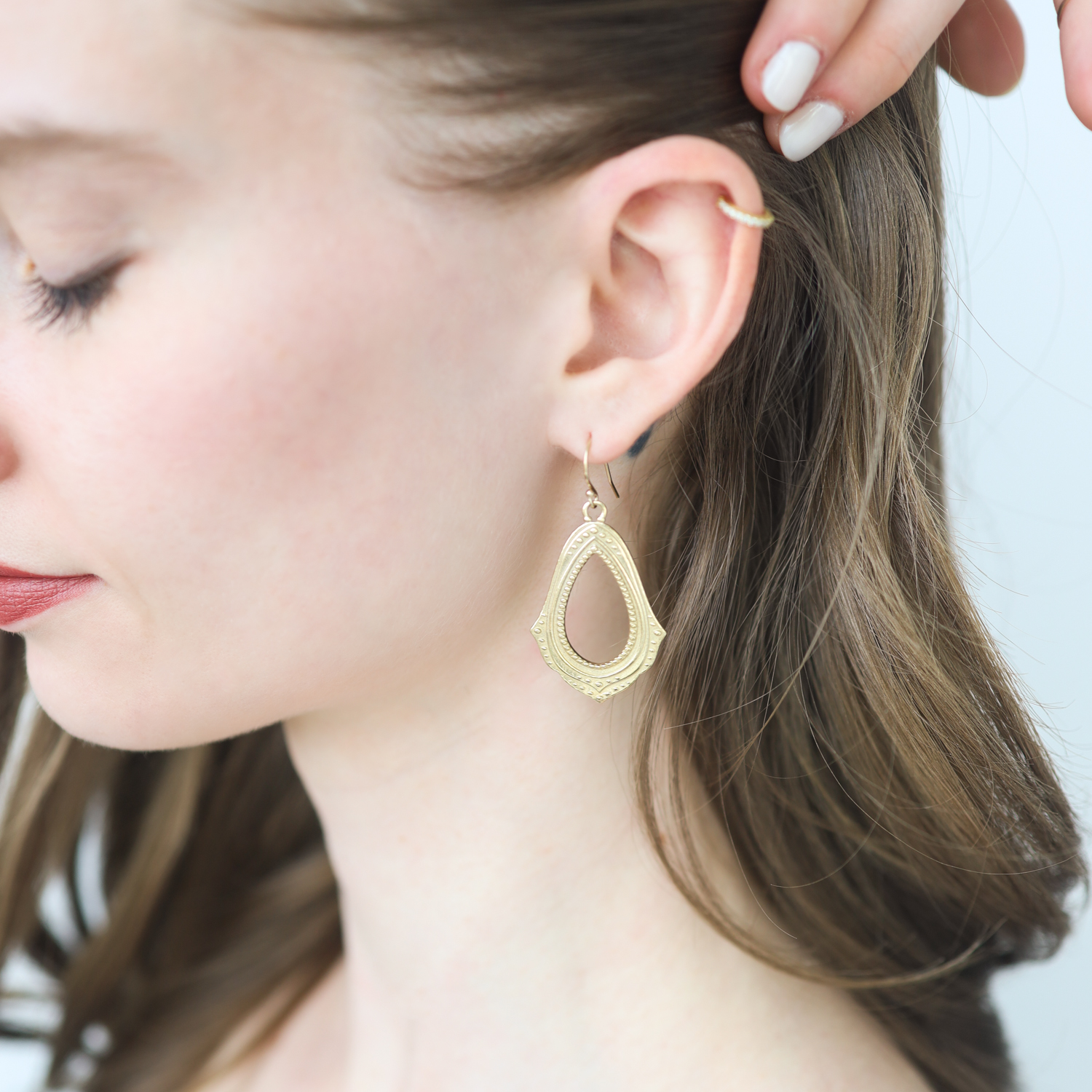 Lulu: Mudra Earrings 'delight in discovery' yellow bronze