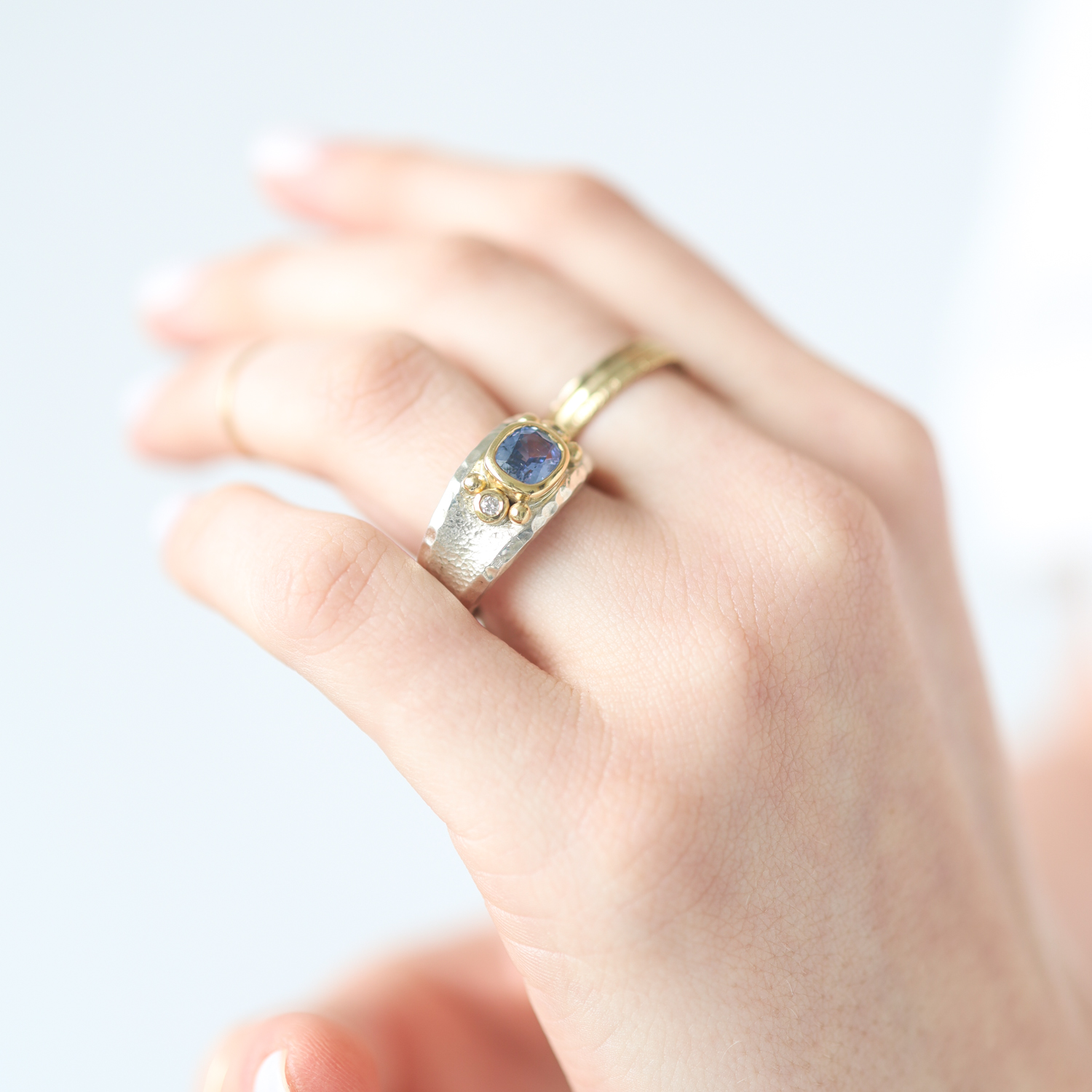 Alison Shiboski: Ring, Sterling silver, Diamond .03ct, Blue sapphire 1.26ct, 18K gold.