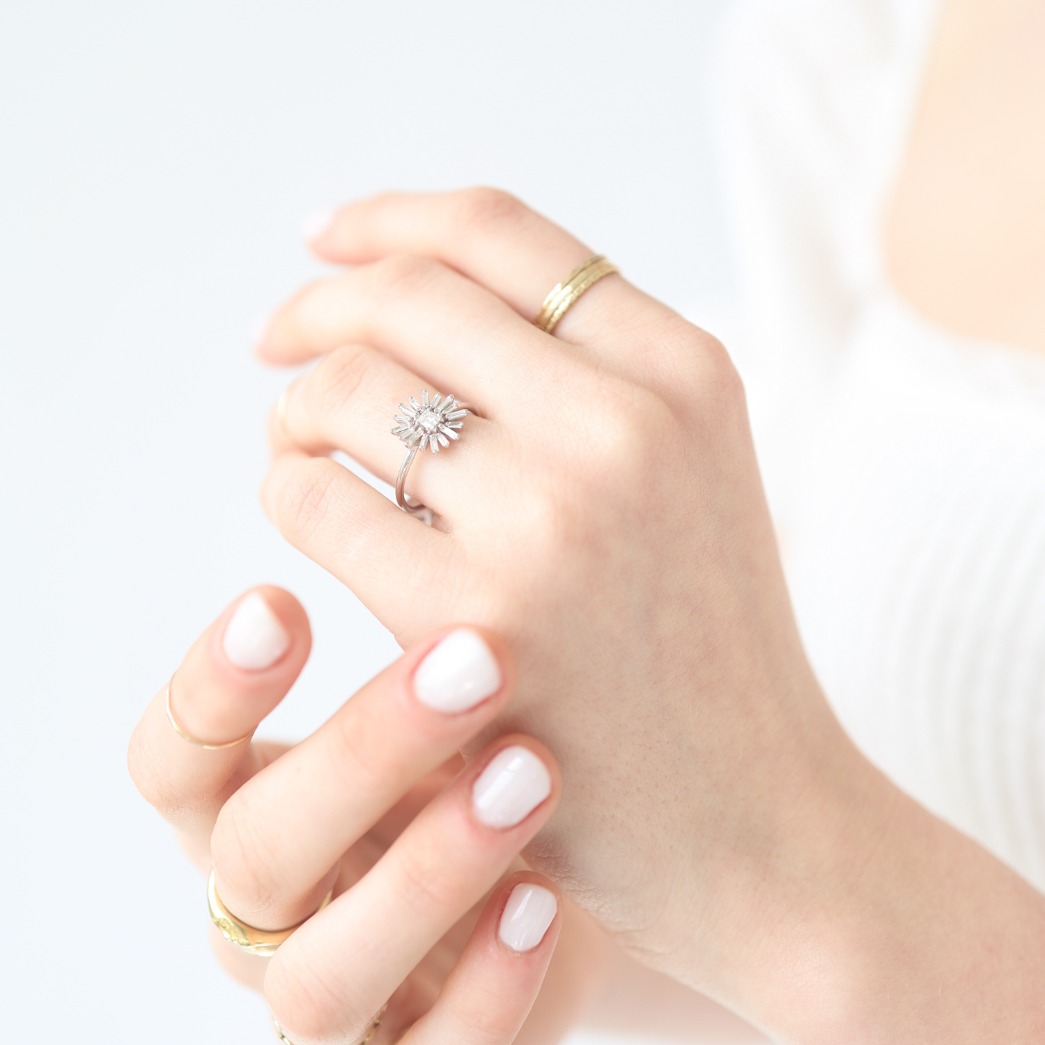 Suzanne Kalan:One of a kind 18k White gold ring,0.22ct baguettes,0.12ct princess cut center stone,size 6.25