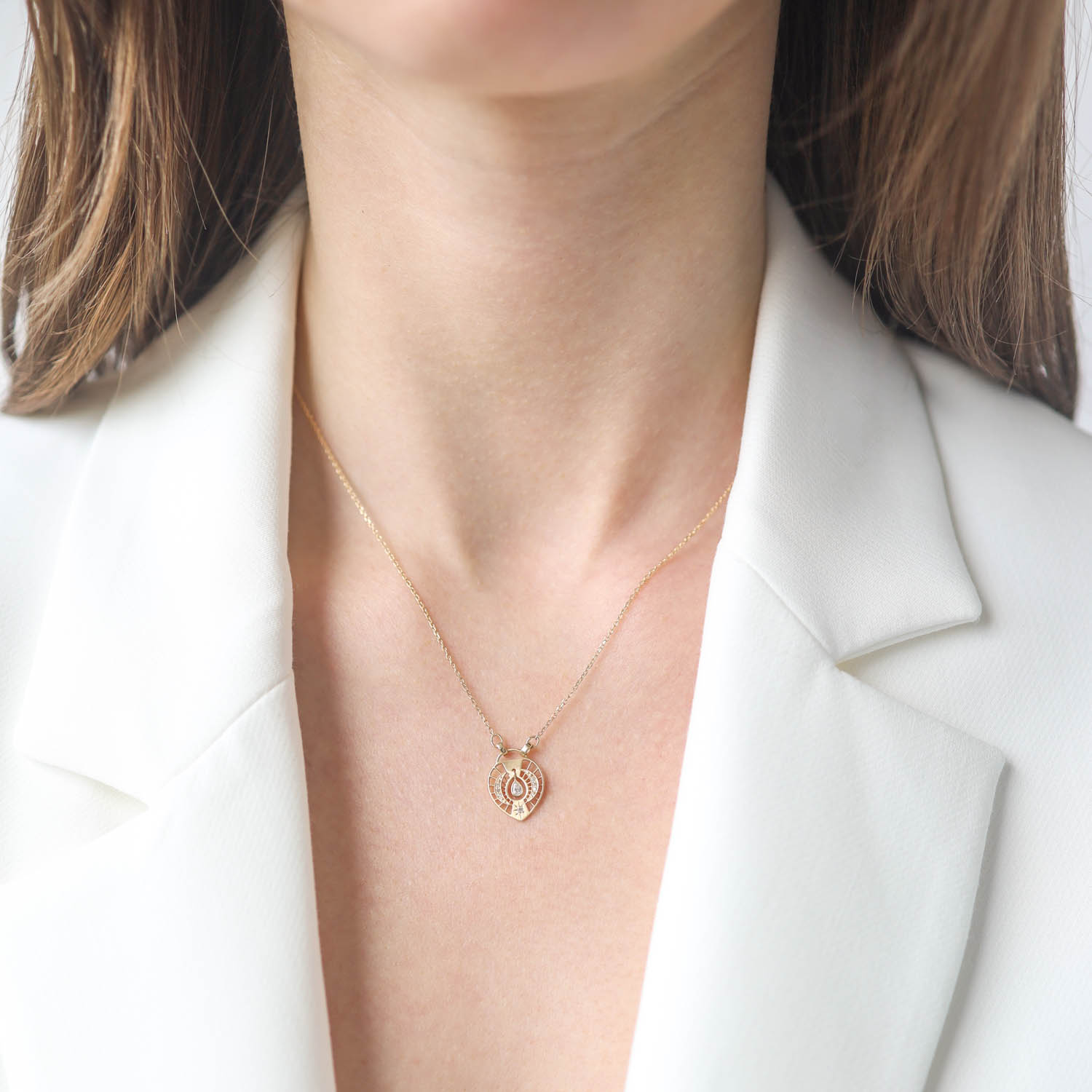 Celine Daoust: Necklace, 14K gold chain, dream catcher open plate pear shape diamond two moons and star, 16" in length, pendant measures 5/8" x 7/16"