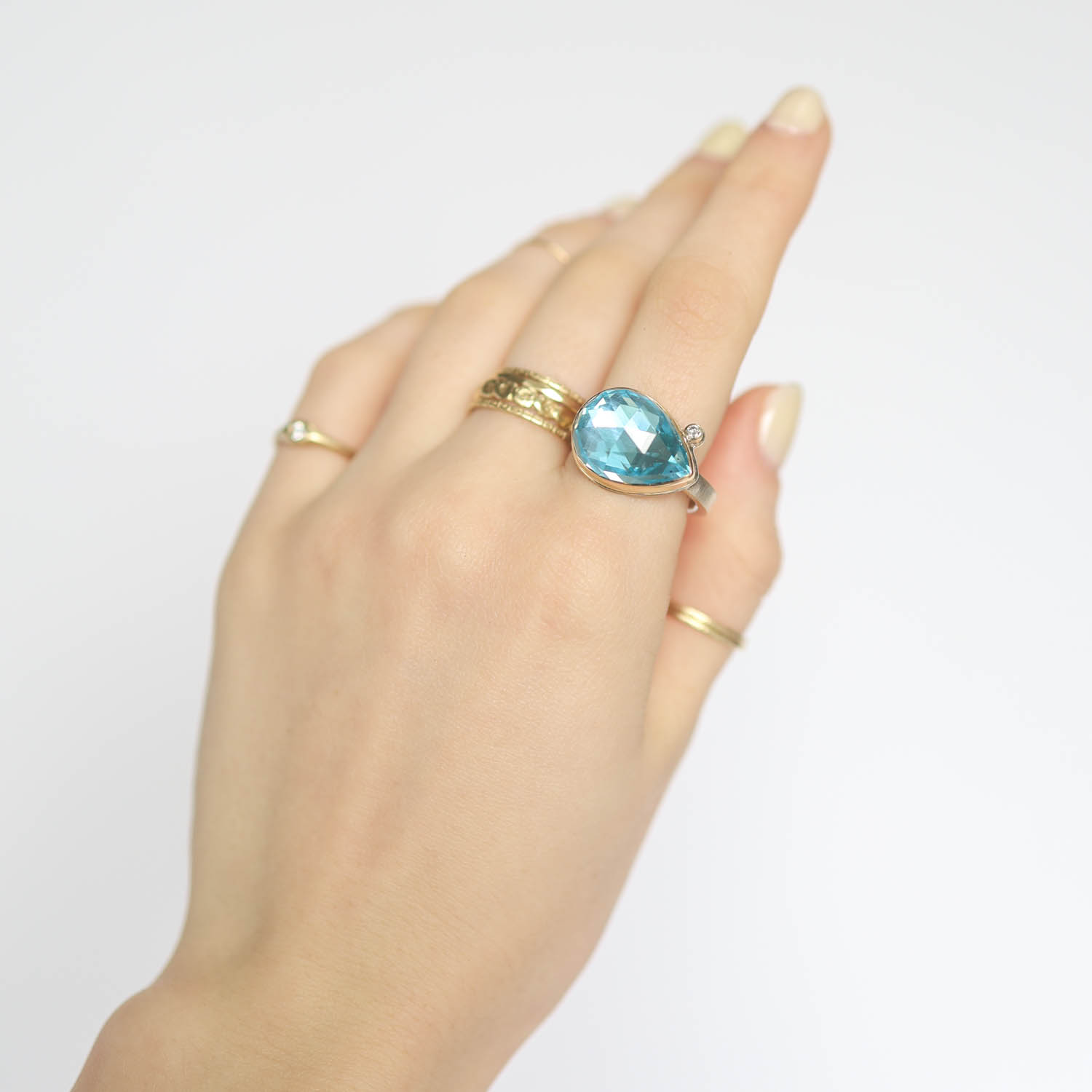 Jamie Joseph: ring, SS & 14K Gold Ring w/ Teardrop Rose Cut SKY BLUE TOPAZ & .03 TCW diamond on X Band 1/2" x 11/16" Size 8