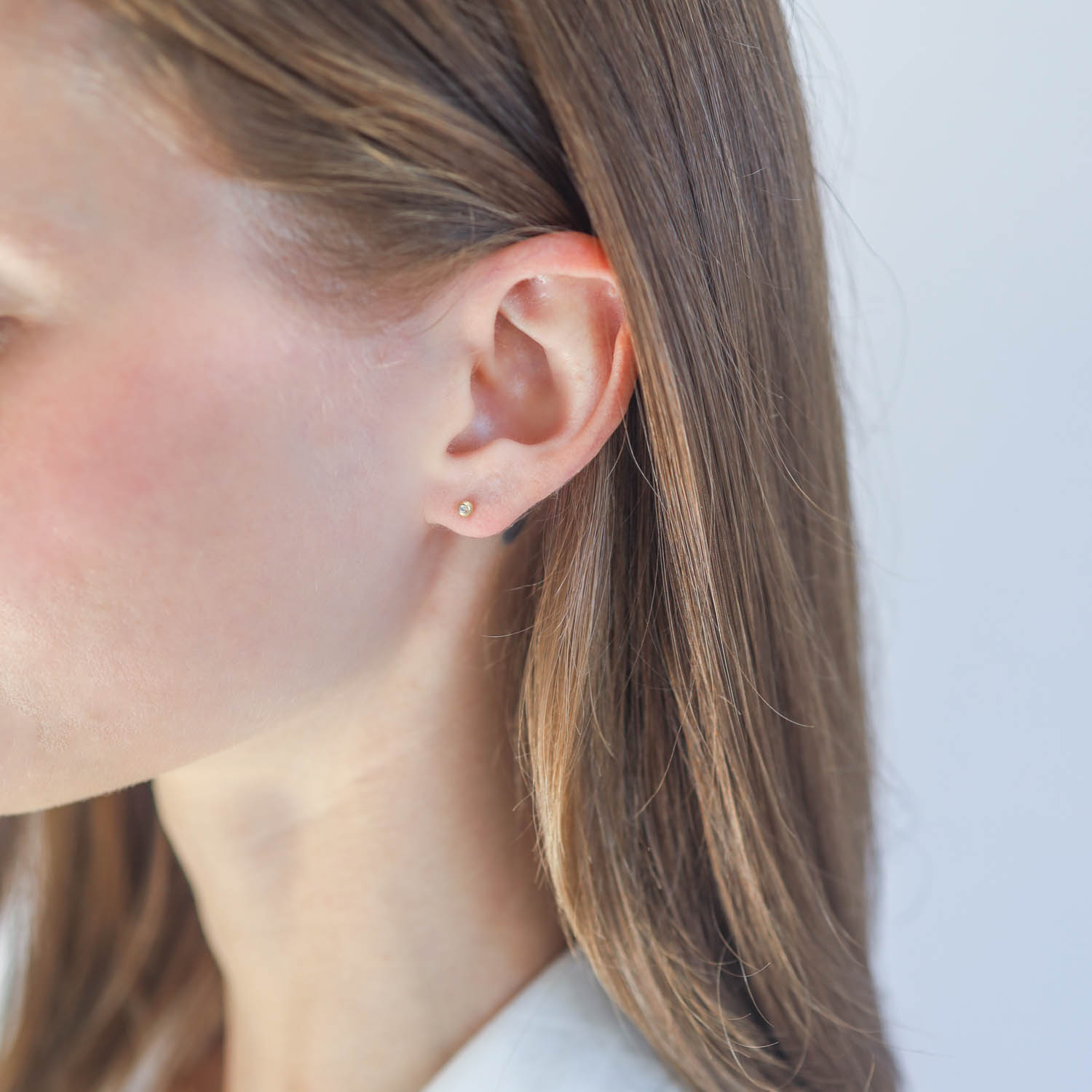 Victoria Cunningham Trunk Show: Earrings, diamond dot post, 14K gold, Measures 3/8" x 3/32" including earwire