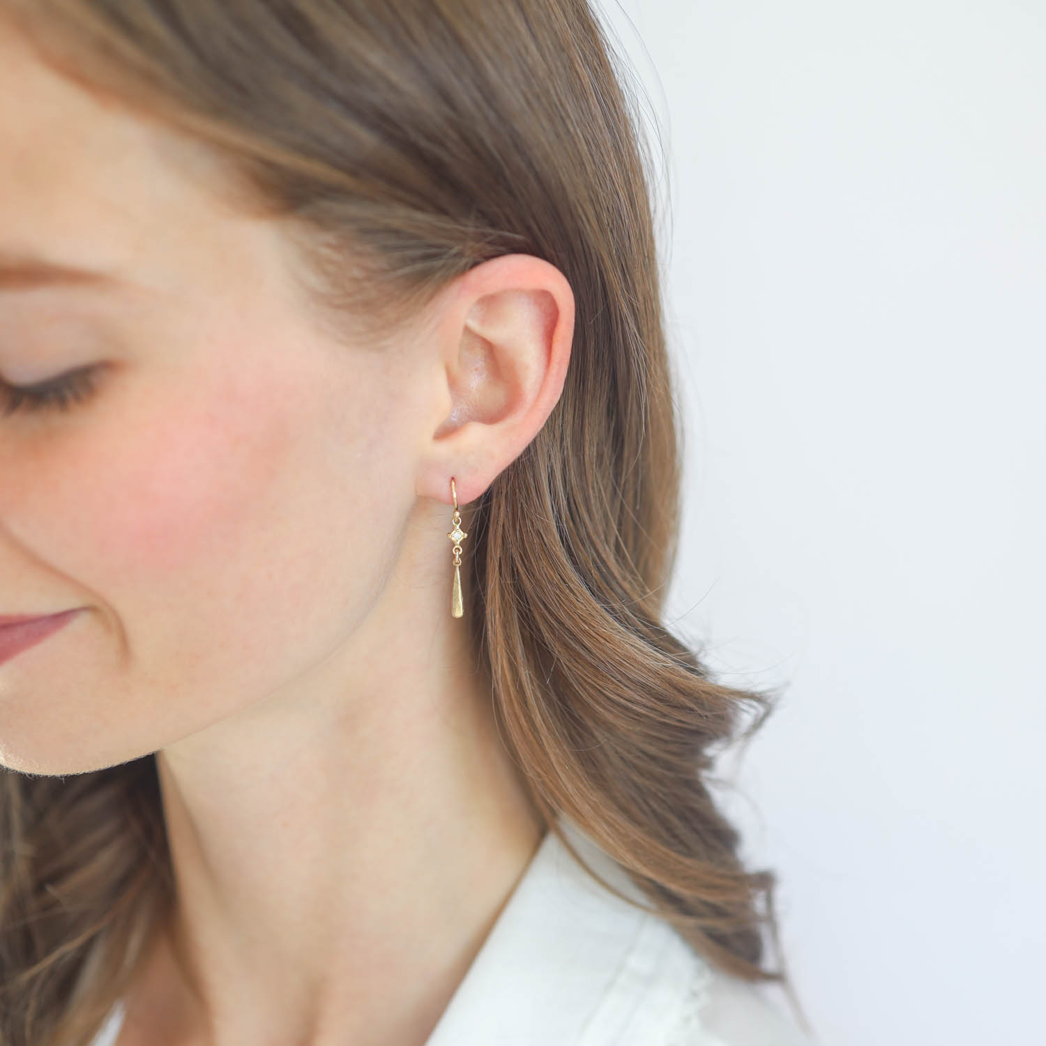 Victoria Cunningham Trunk Show: Earrings, Studs, Diamond bezel w/ long teardrop 14K Yellow Gold. 1 1/8" x 3/16" inc earwire
