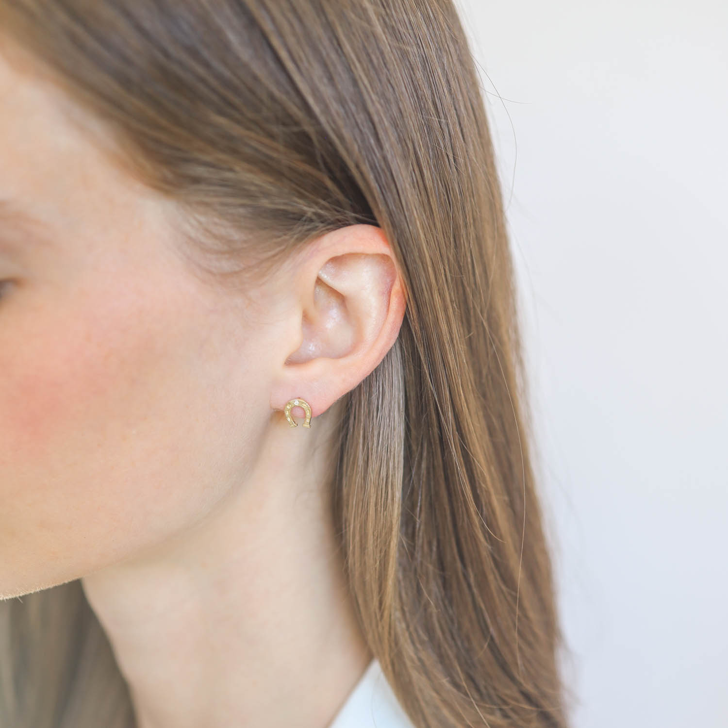 Victoria Cunningham Trunk Show: Earrings, horse shoe post w/ diamond 14K Yellow Gold 5/16" x 5/16"