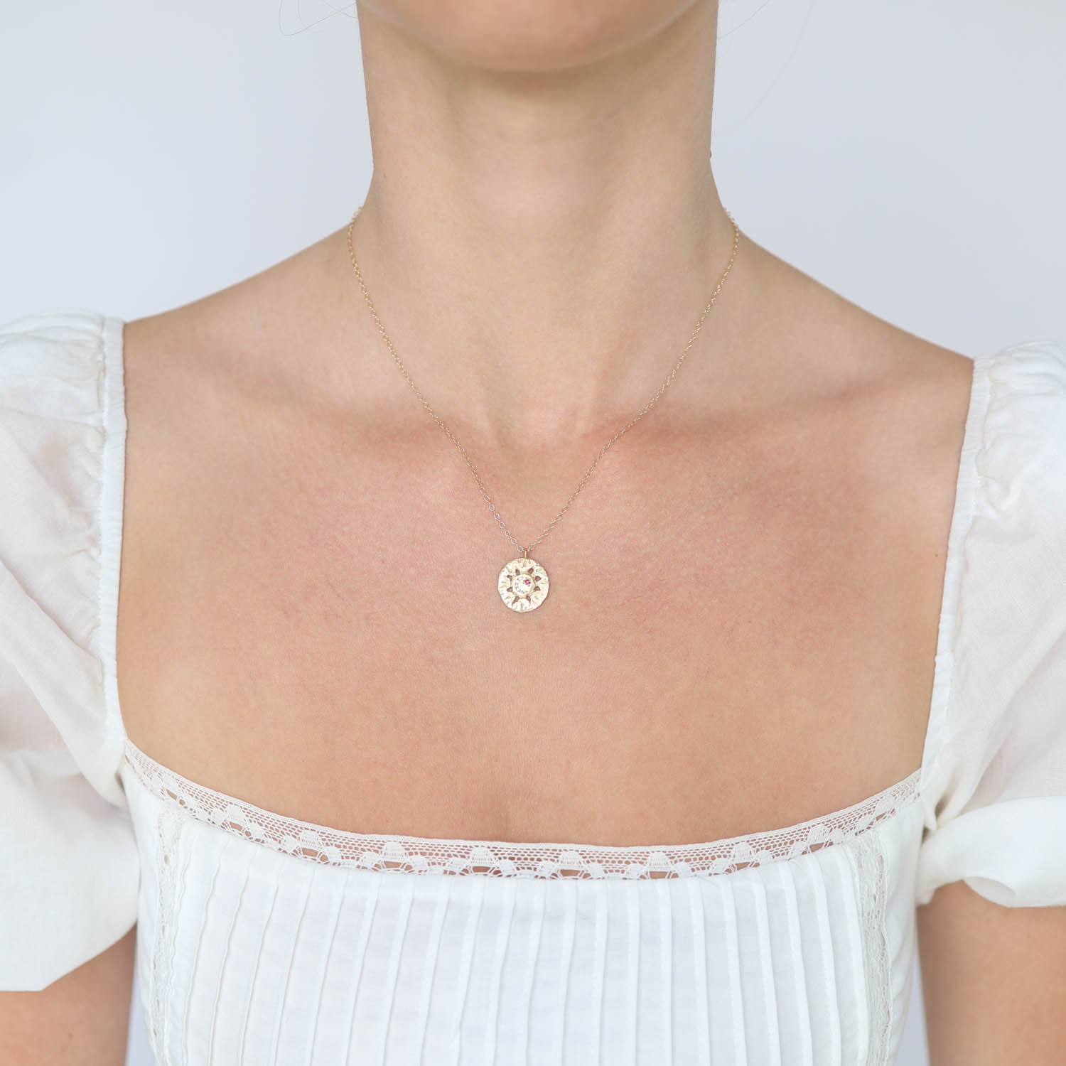 Victoria Cunningham Trunk Show: 14K solar eclipse w/ channel set diamonds + ruby