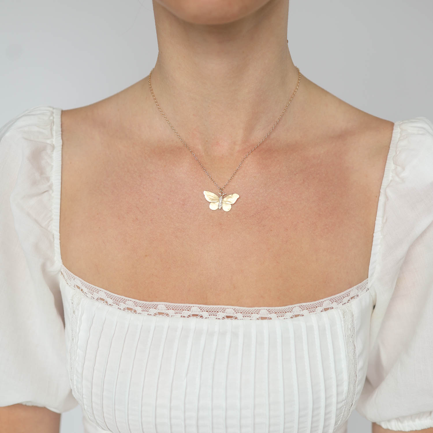Victoria Cunningham : 14K Sculpted butterfly w/pave diamond body