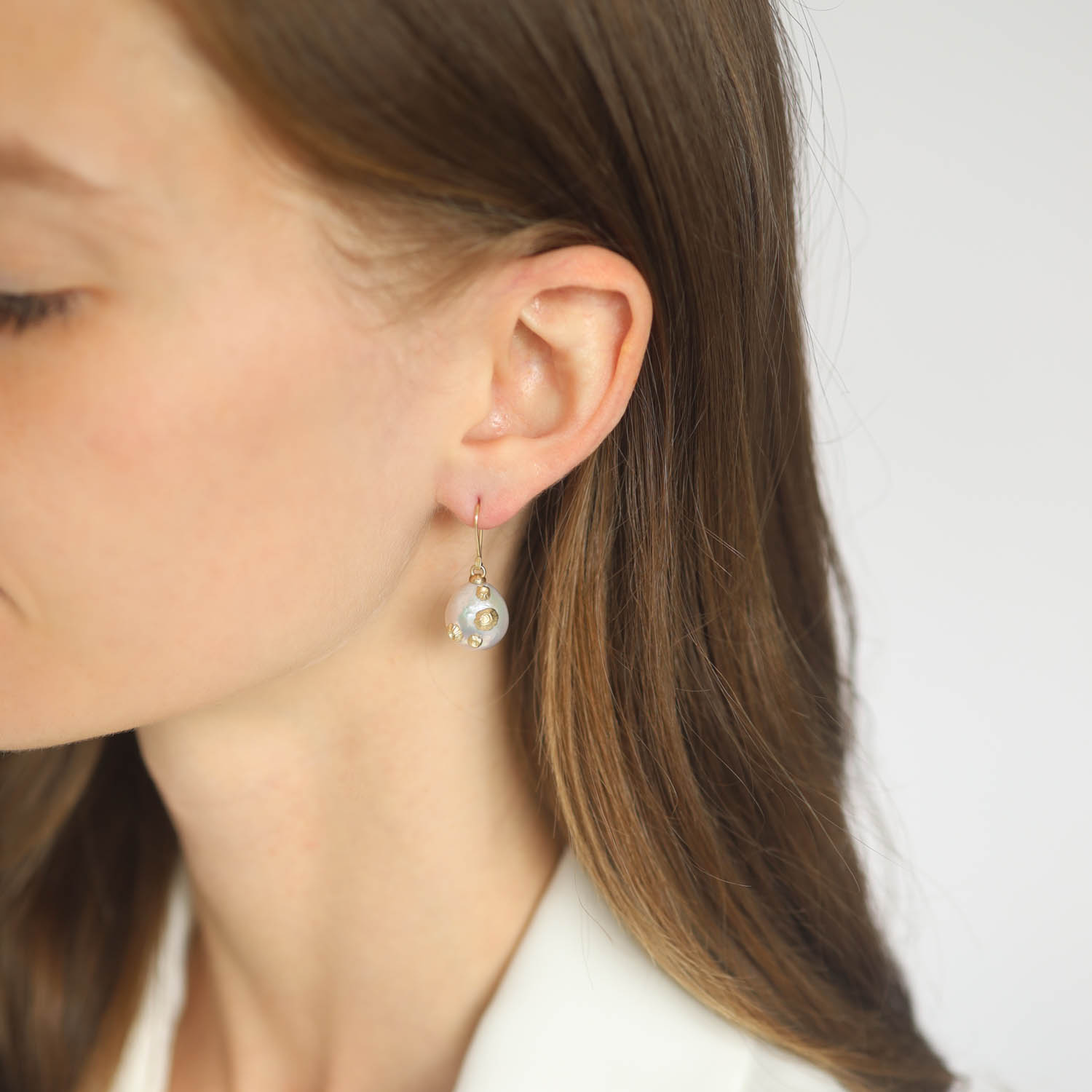 Hannah Blount: Baroque Pearl Ruthie B. Earrings with Barnacles 14K gold Measures 1 1/8" x 1/2" includuing earwire
