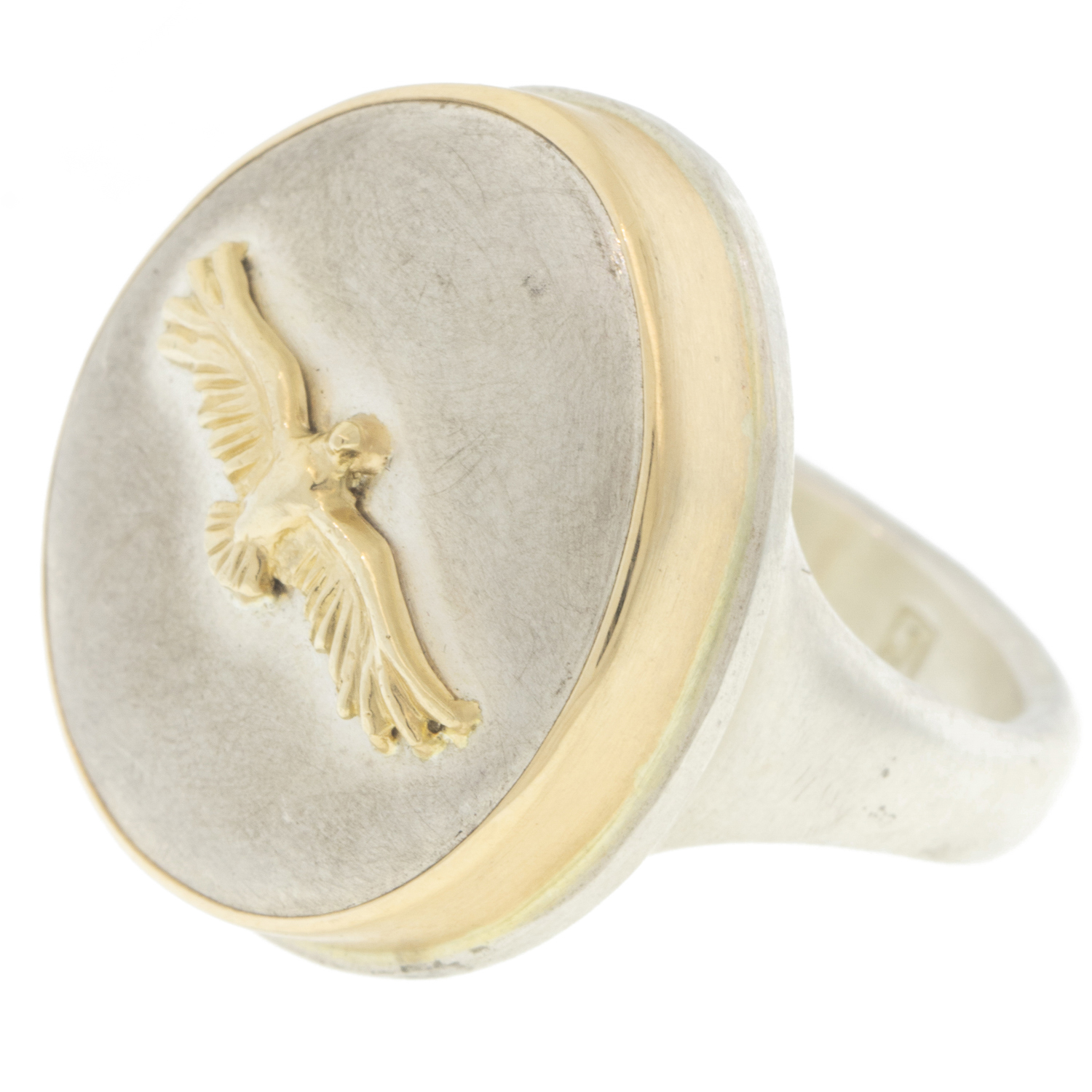Jamie Joseph: Ring, Vertical asymmetrical, 14K bezel set Eagle on open back platform, Hidden feather charm, Sterling silver band, Measures 7/8 x 3/4 size 7