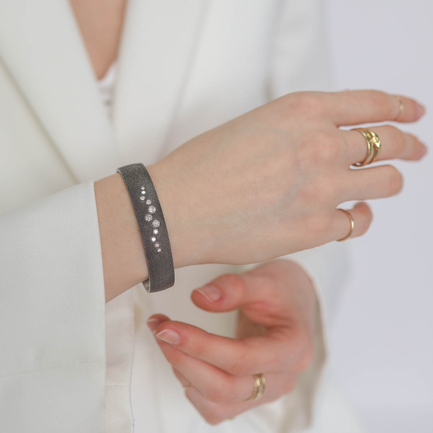 925SUNEERA: Bracelet, Cuff, Annette, White diamonds, .88 TCW, Rhodium plated sterling silver, Measures 7/8" in width.