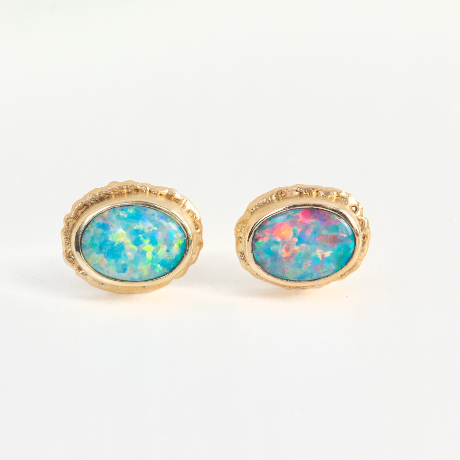 Jamie Joseph Trunk Show: 14K Gold Post Earrings w/ 7 x 5mm Oval AUSTRALIAN OPAL on Ruffled Platform, Measure 5/16" x 1/4"
