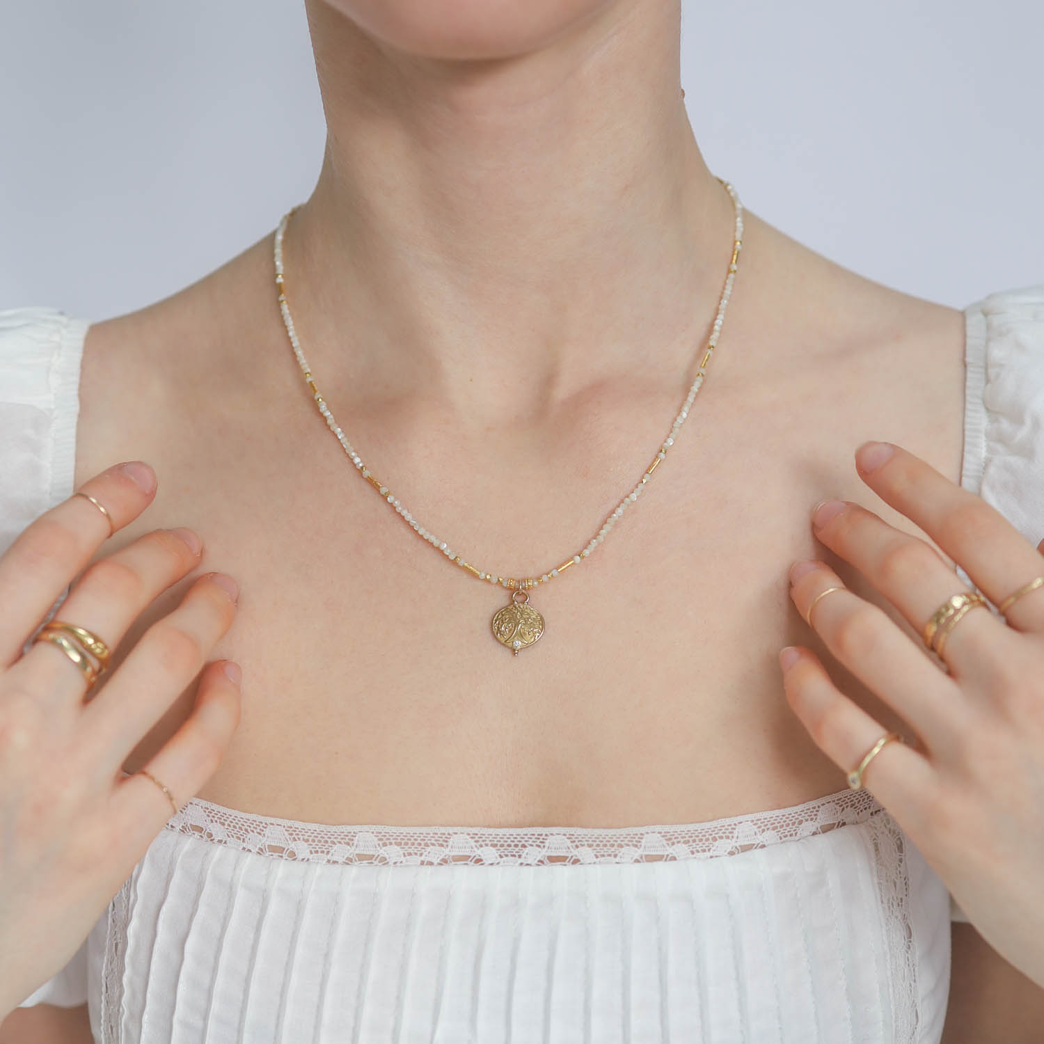 LuLu: RAINA Necklace Mother of Pearl/ Gaia, Adjustable chain measures 17"-19", Pendant measures