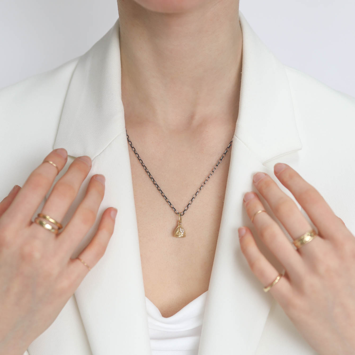 Erica Molinari Trunk Show: 14k 2 petal diamond lotus + evil eye bell - .13cts