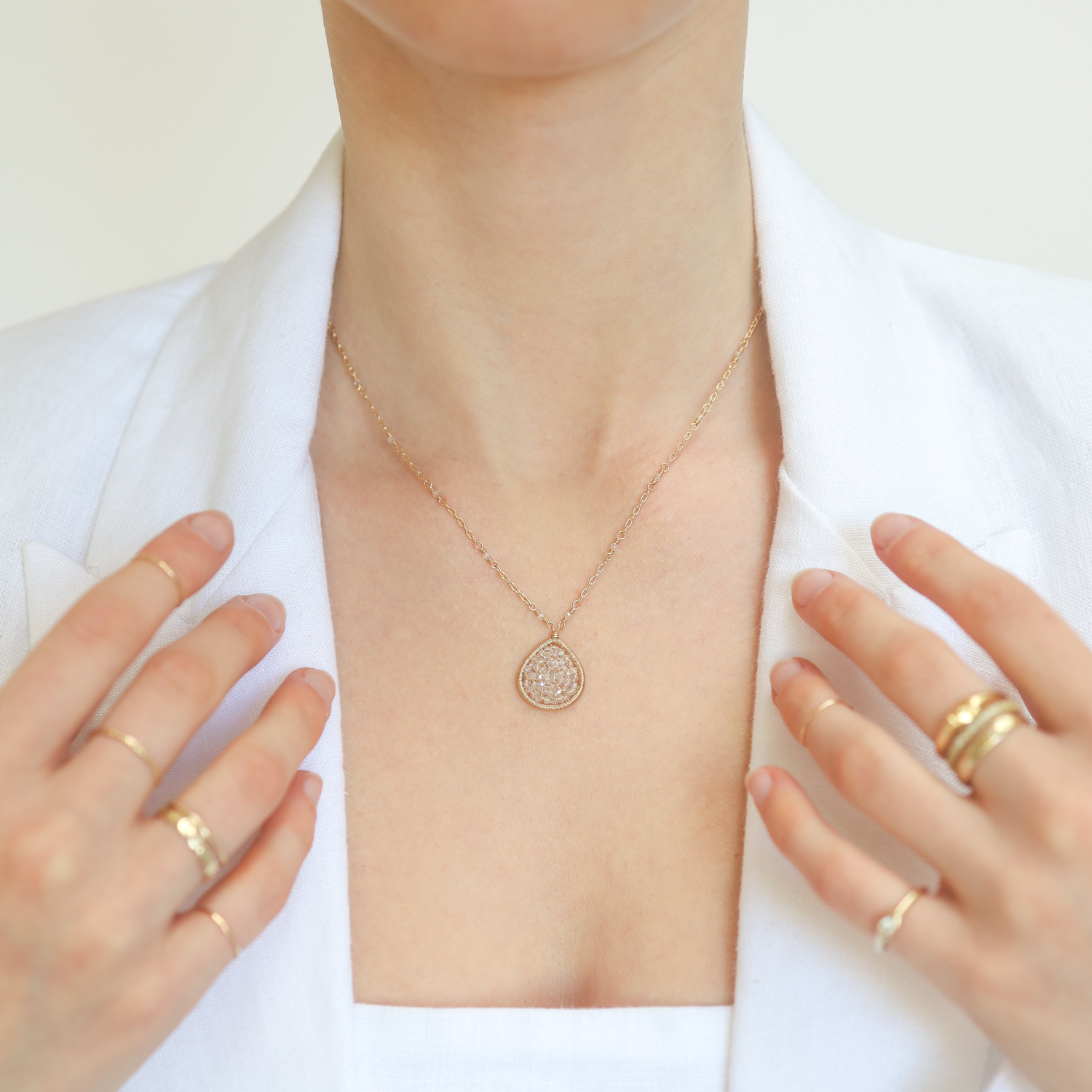 Dana Kellin : Necklace ,Tear drop clear crystal pendant,gold filled chain with crystals, 3/4" x 5/8" no bail, 17"