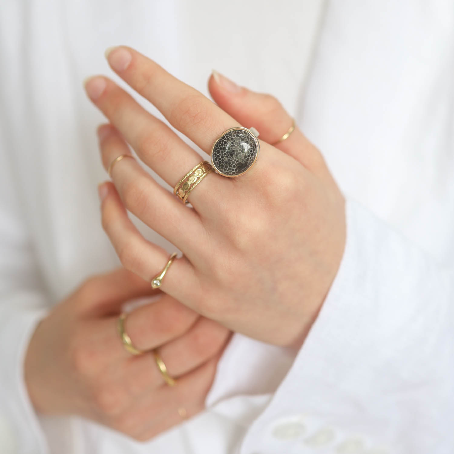 Jamie Joseph: Fossilized Stingray Coral SS & 14k gold ring with Small Round on Y band, sz 7, 9/16" x 11/16"
