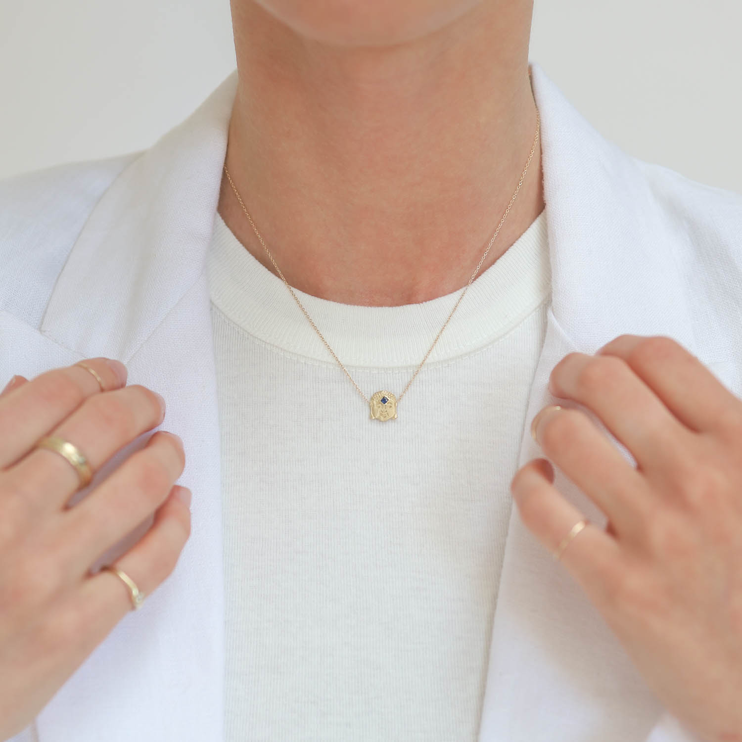 Victoria Cunningham Trunk Show: Necklace,14K Buddha and Sapphire