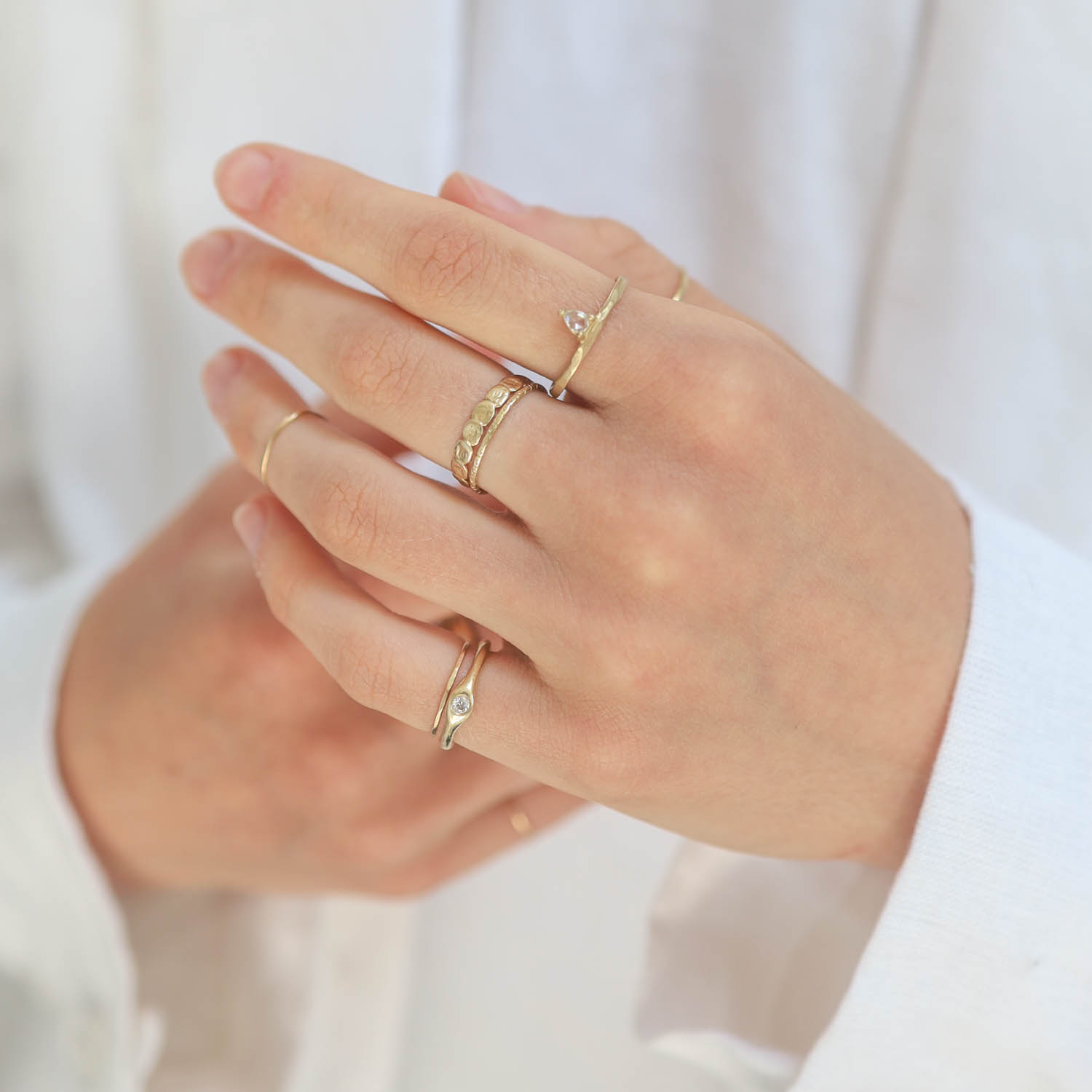 Victoria Cunningham Trunk Show: Ring,One of a kind,14k Yellow Gold, 0.12ct Pear diamond solitaire,prong set,Hammered finish