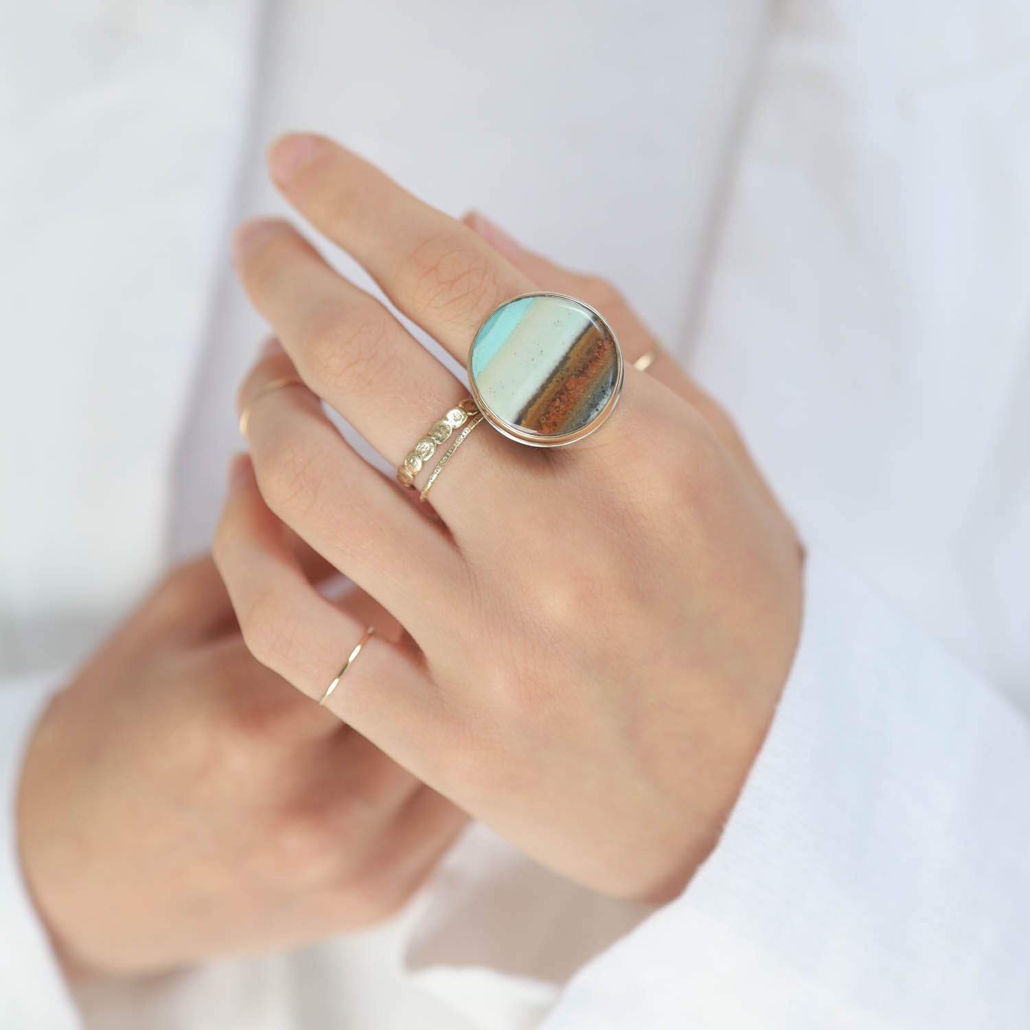 Jamie Joseph : Sterling & 14K gold ring with Round blue Indonesian Fossilized opalized wood on live edge band size 7, 7/8 diameter