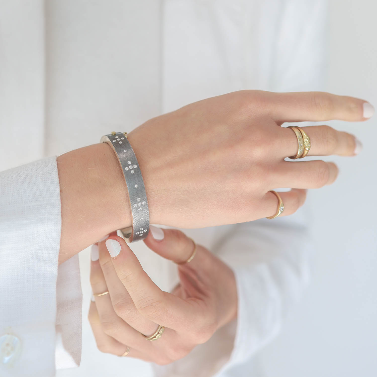 Rene Escobar : Bangle,SHAYNA,8 MM Silver w/diamonds,0.60CT , sz Medium