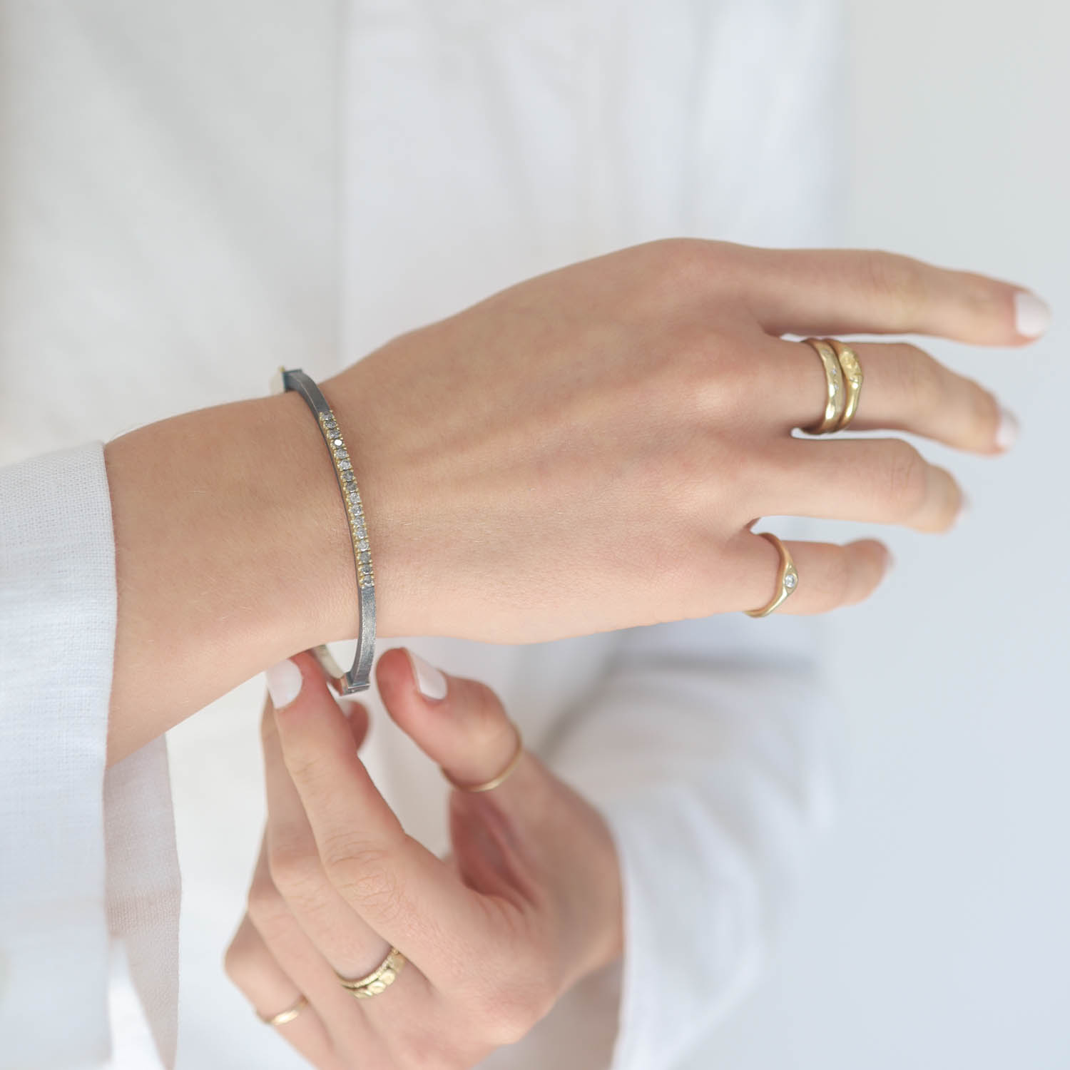 Rene Escobar: Bangle, ZOE, 2.5 MM YG Front Fishtail Section, SS Back, .48 ct diamonds, Med