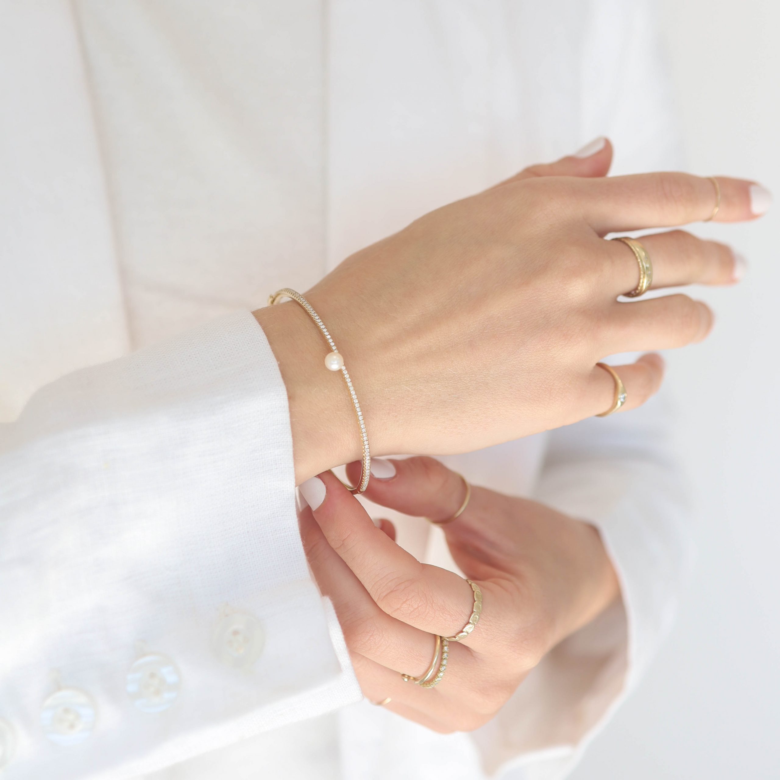 Mizuki: Bracelet, 14kt, one row diamond and freshwater pearl cuff, .4ct