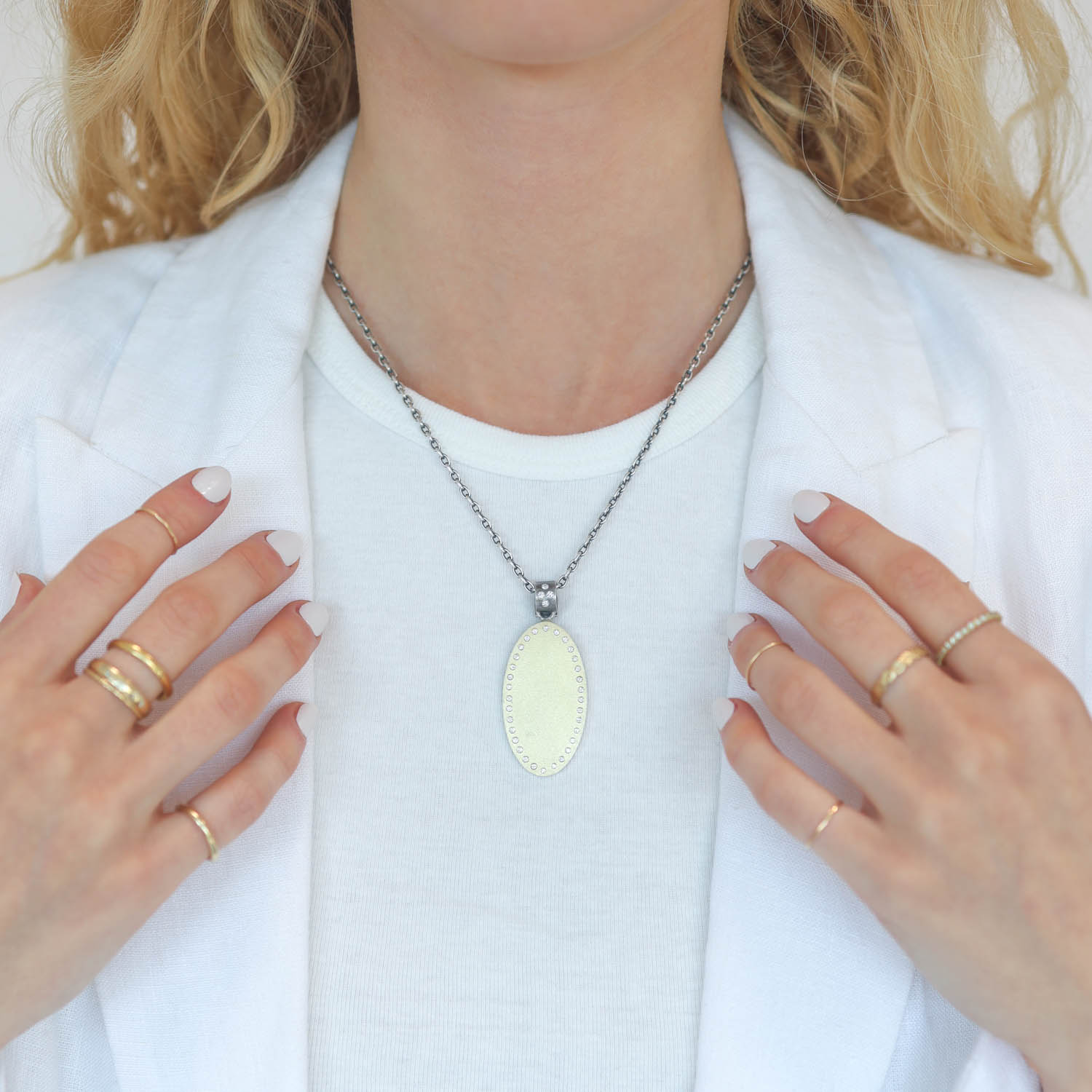 Rene Escobar Trunk Show: PENDANT IN SILVER YELLOW GOLD AND DIAMOND 0.70CT