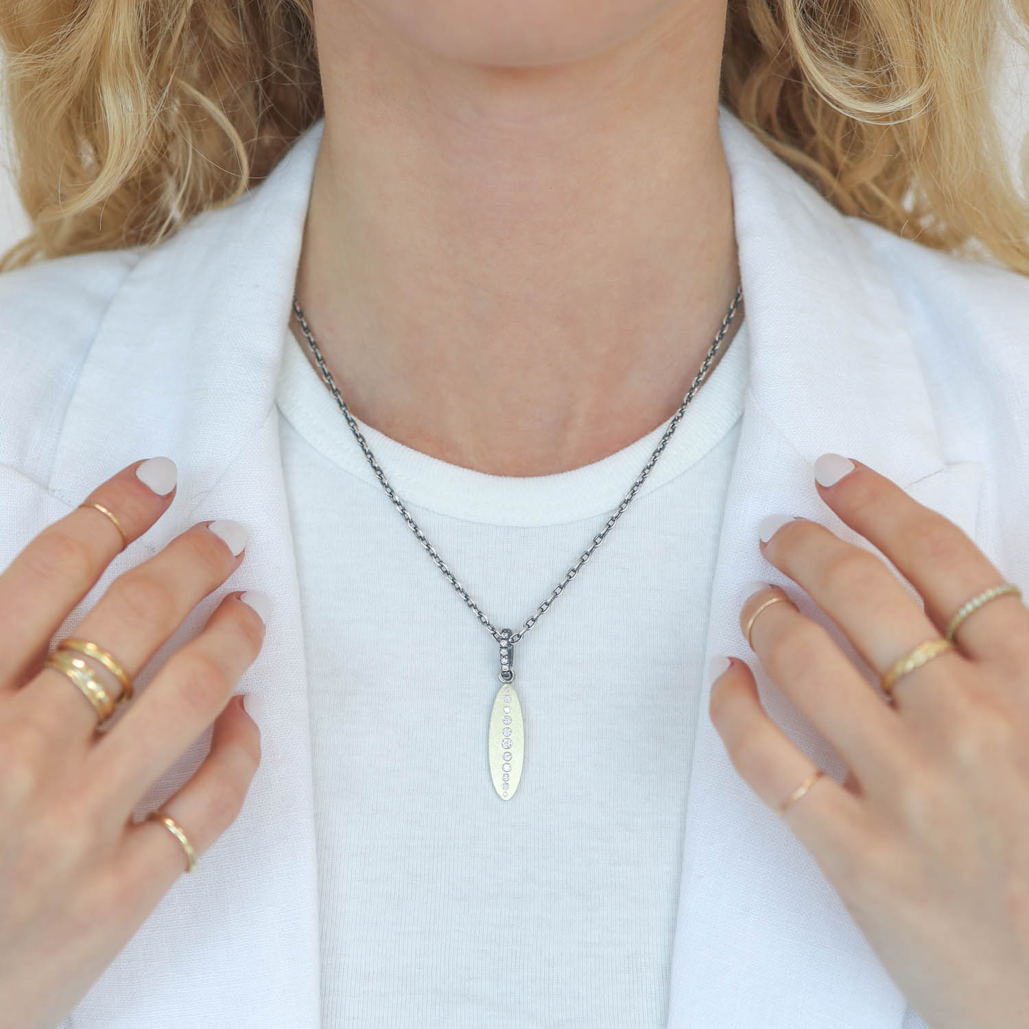 Rene Escobar Trunk Show: PENDANT IN SILVER YELLOW GOLD AND DIAMOND 0.38CT
