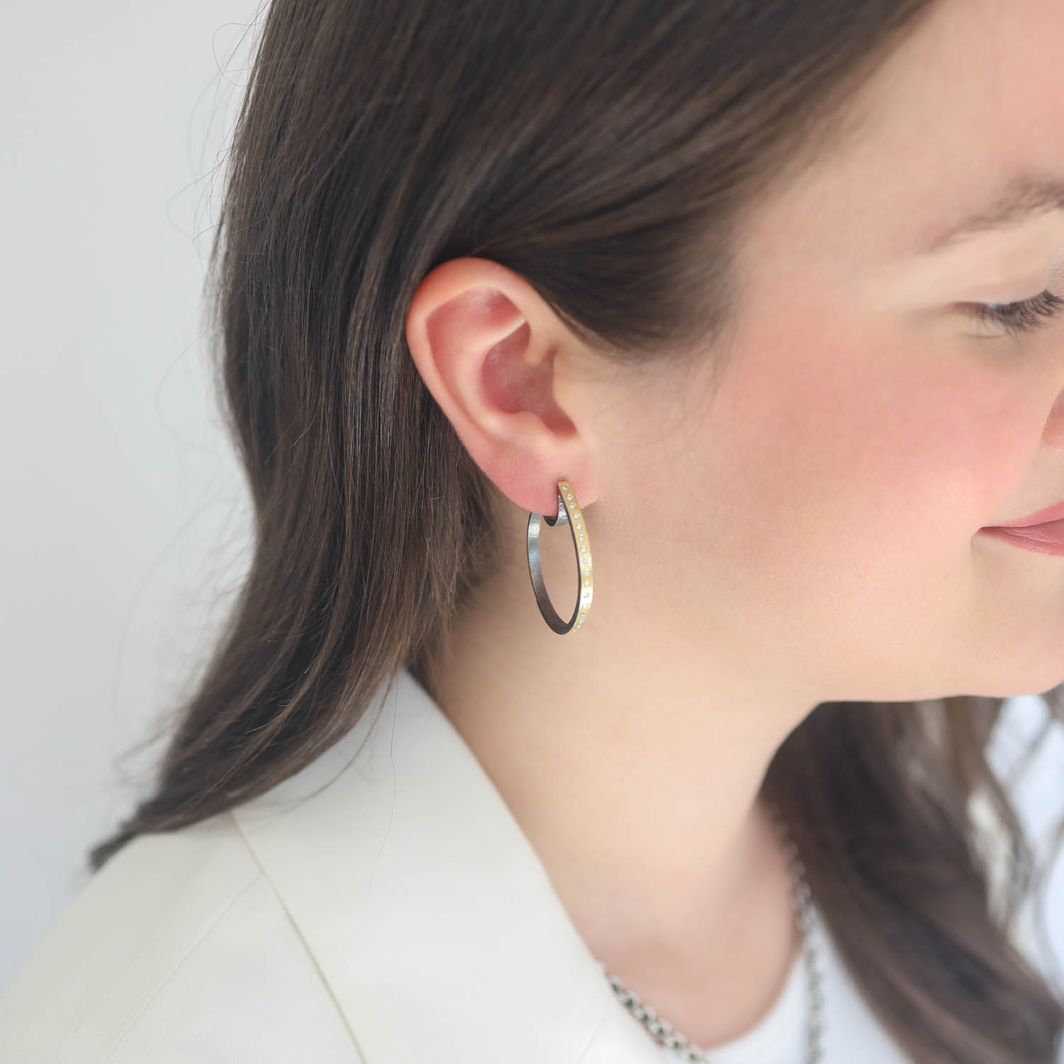Rene Escobar Trunk Show:EARRINGS IN YELLOW AND SILVER .45CT 9.25GR TOTAL - 3GR 18K 6.25GR SS