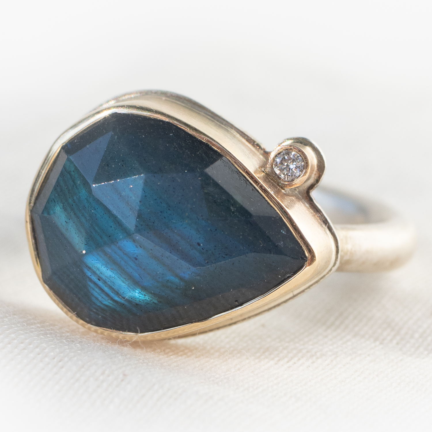Jamie Joseph: Labradorite, SS & 14k Gold Ring, Small teardrop Rose Cut & .025 TCW satellite diamond on Egyptian Band, size 7.25 7/16" x 9/16"