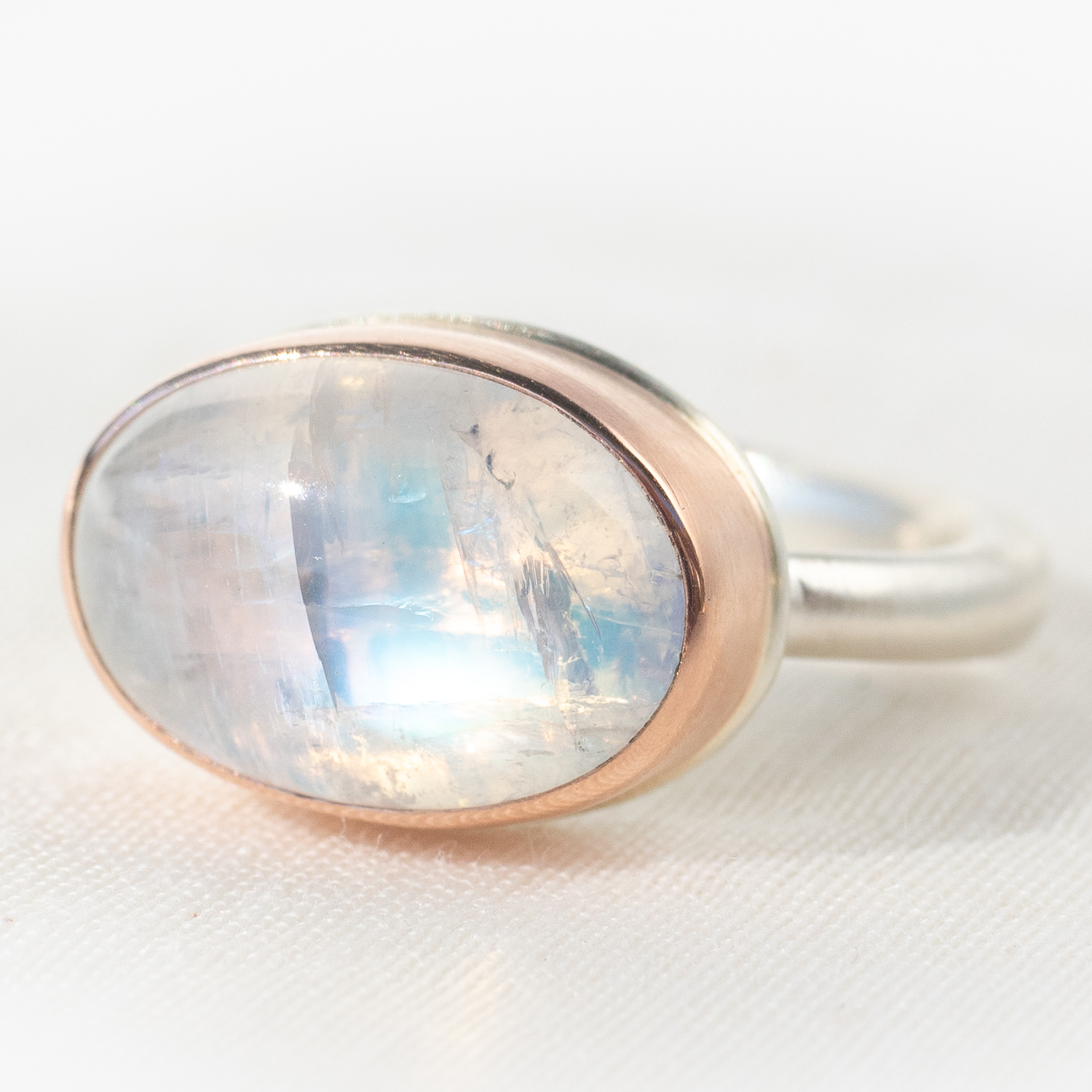 Jamie Joseph: Sterling & 14K Rose Gold Ring w/ Small Oval Smooth WHITE RAINBOW MOONSTONE on Egyptian Band