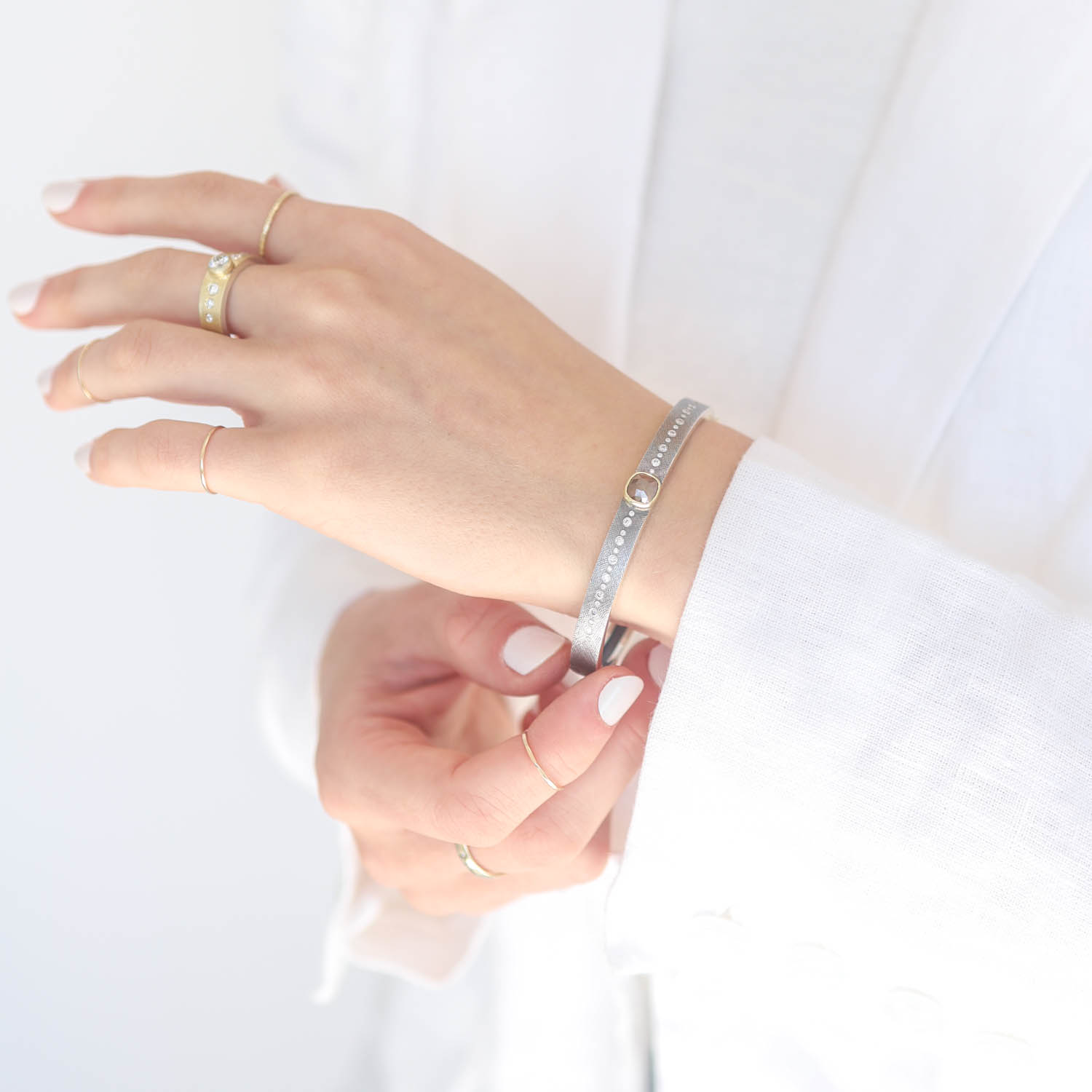 Rene Escobar Trunk show:BANGLE 6MM IN SILVER 18K YG 2CT ROSE CUT DIAMOND AND 0.24CT WHITE DIA