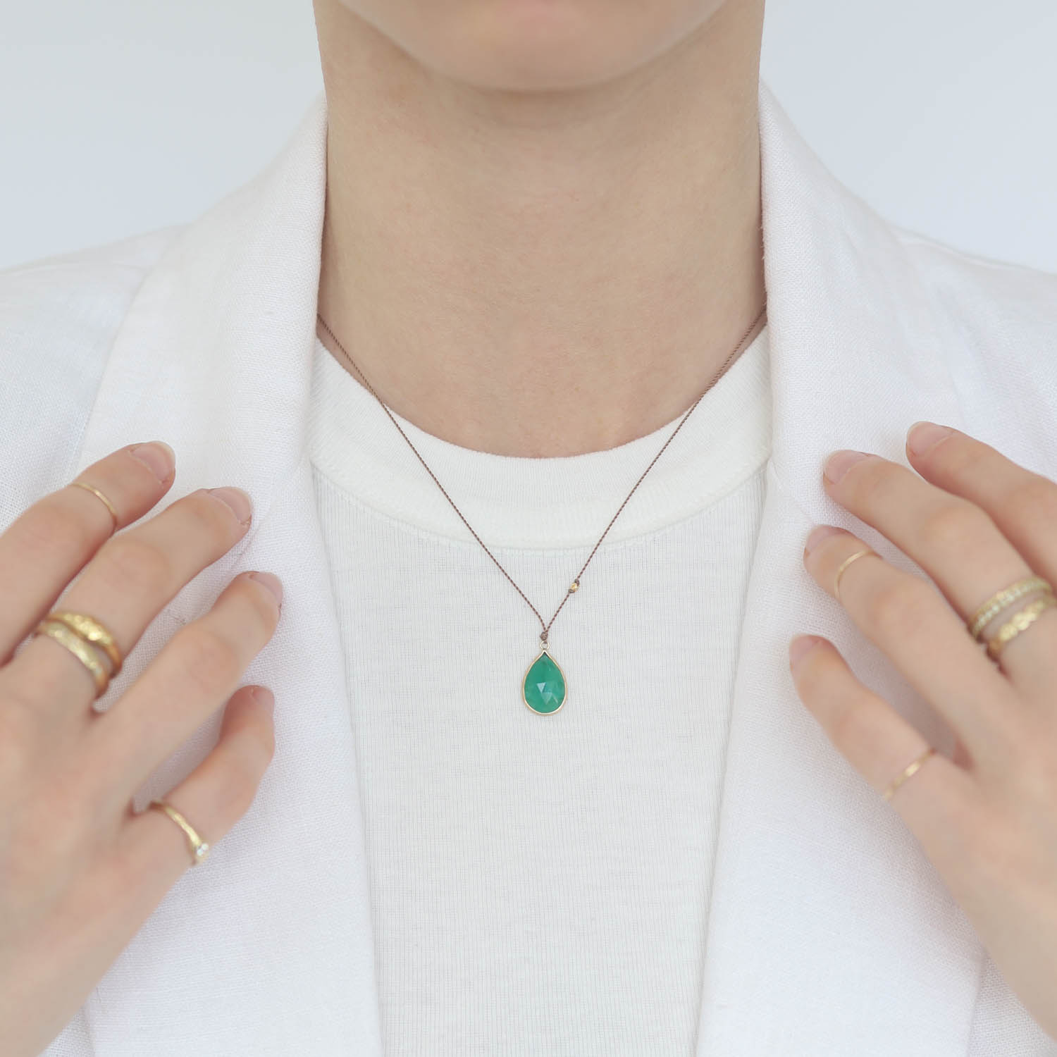 Margaret Solow: Necklace, Emerald, 14K yellow gold, Nylon cord