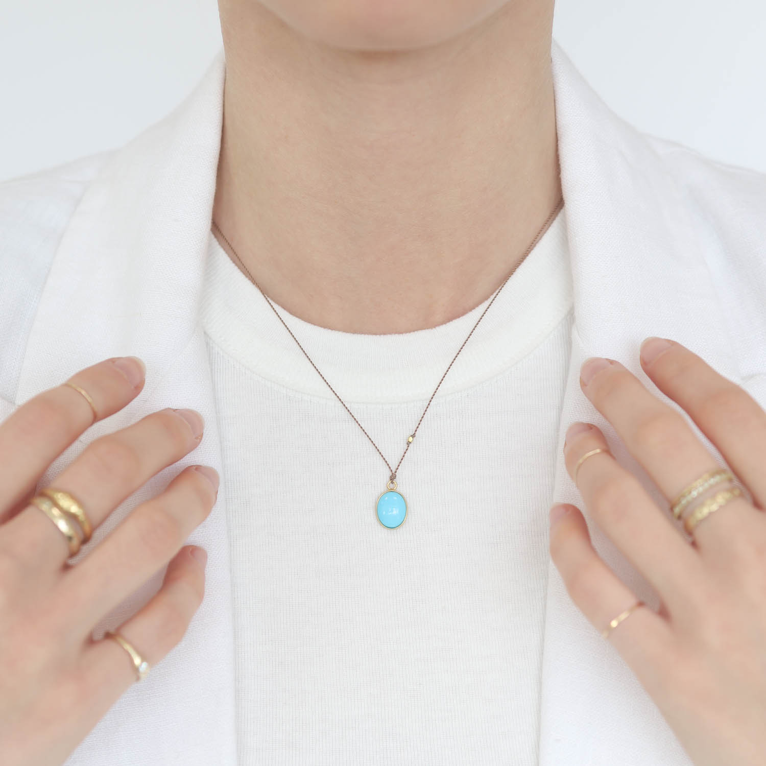 Margaret Solow: Necklace, Sleeping Beauty Turquoise Cabochon, 18K yellow gold, Nylon cord