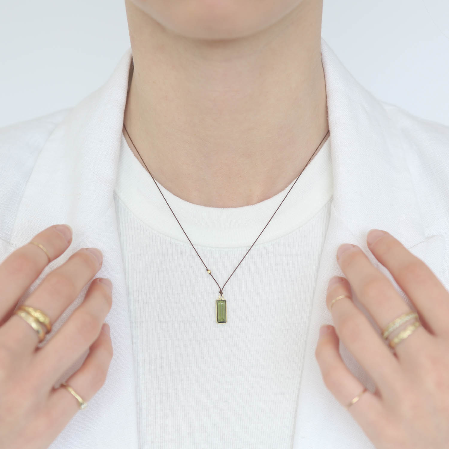 Margaret Solow: Necklace, Tourmaline baguette, 18K yellow gold, Nylon cord