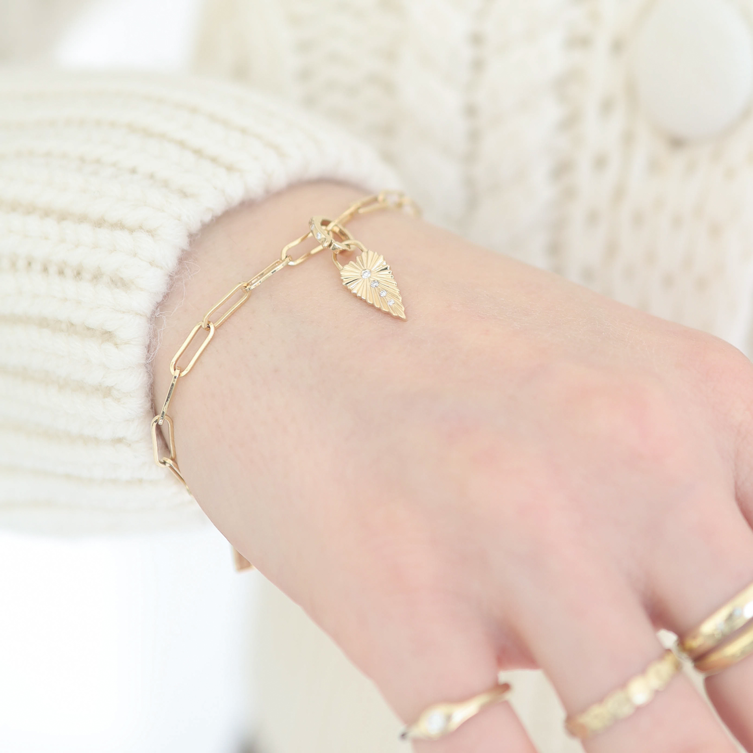 Three Stories Jewelry: SINGLE,Ruffled Heart charm,0.03tcw diamond,14k yellow gold, measures 11/16" x 1/4"