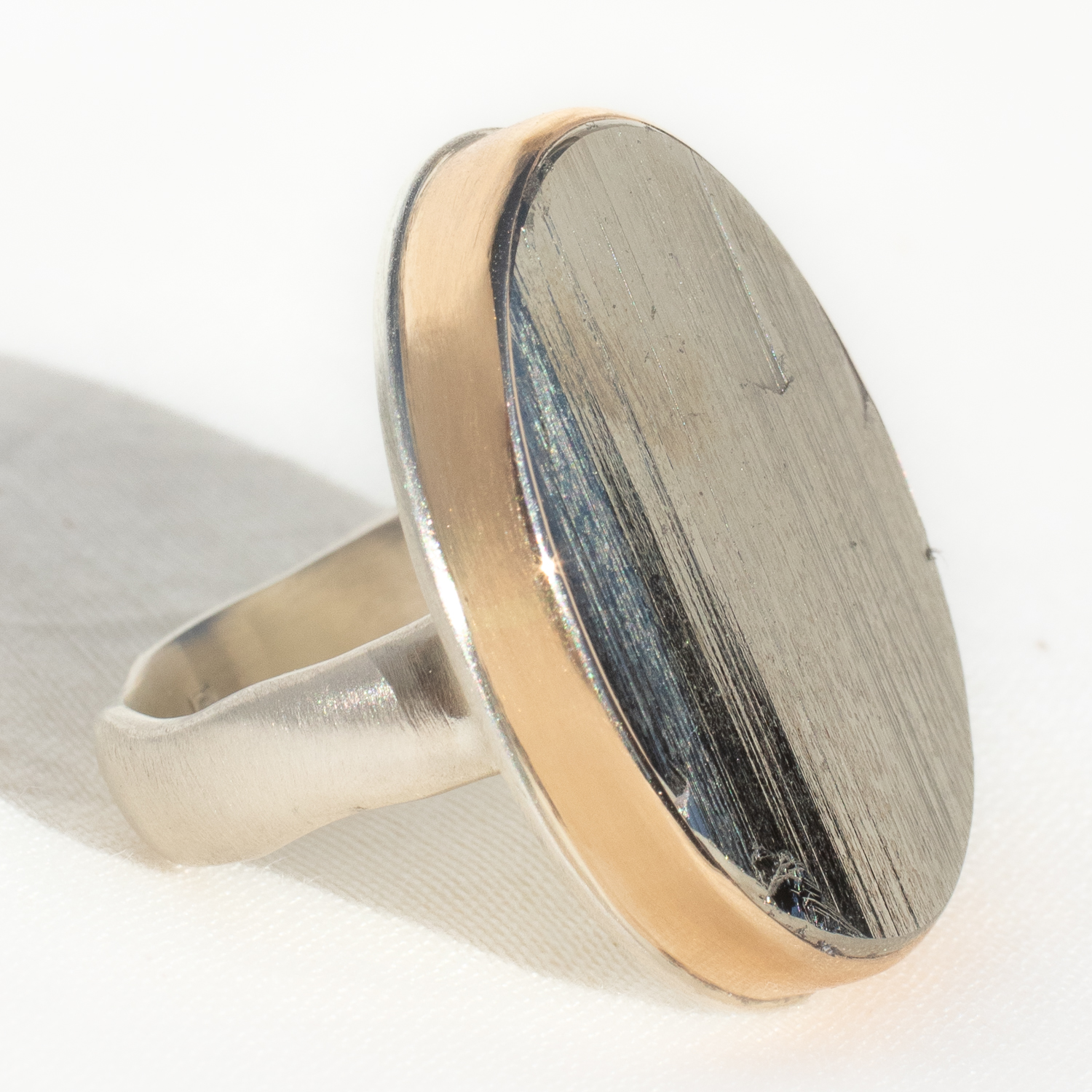 Jamie Joseph: SS & 14K Gold Ring w/ Large Vertical Oval Surface Cut PYRITE on Groovy Band