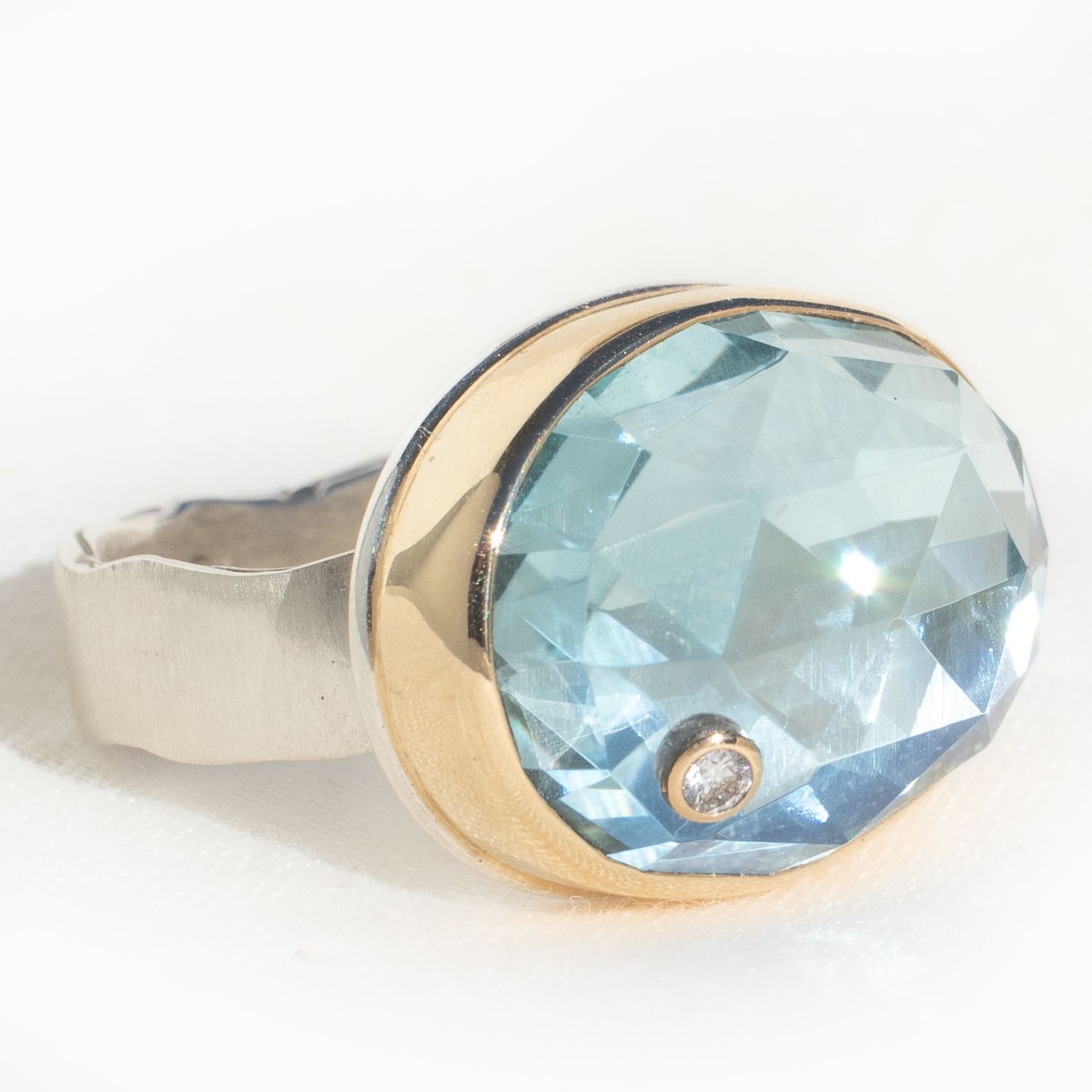 Jamie Joseph:Sterling & 14K Gold Ring w/ Oval Rose Cut SKY BLUE TOPAZ & .03 ct Diamond on Wide Eroded Live Edge Band, Stone Measures 9/16" x 3/4", Size 8