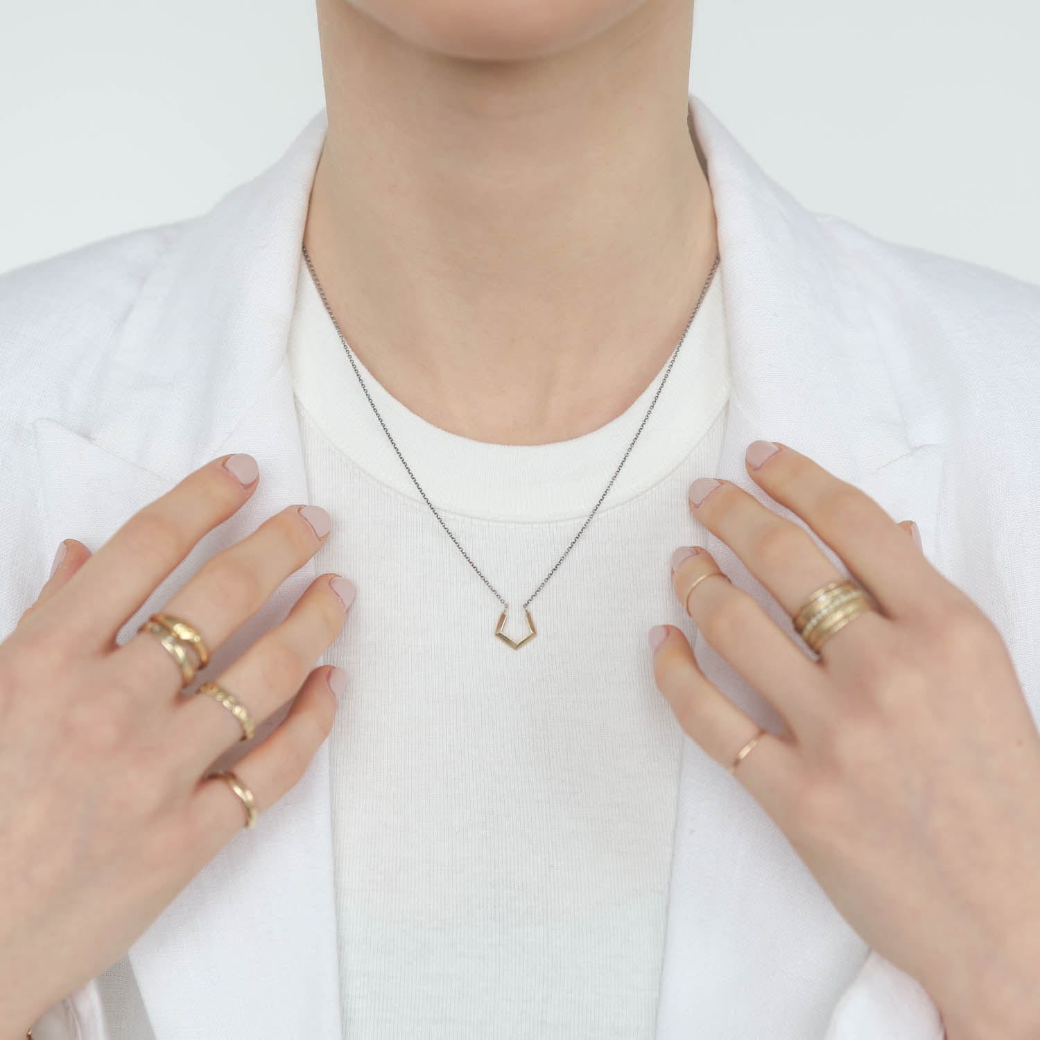 Kaylin Hertel: 14K yellow gold and SS pentagon neckalce