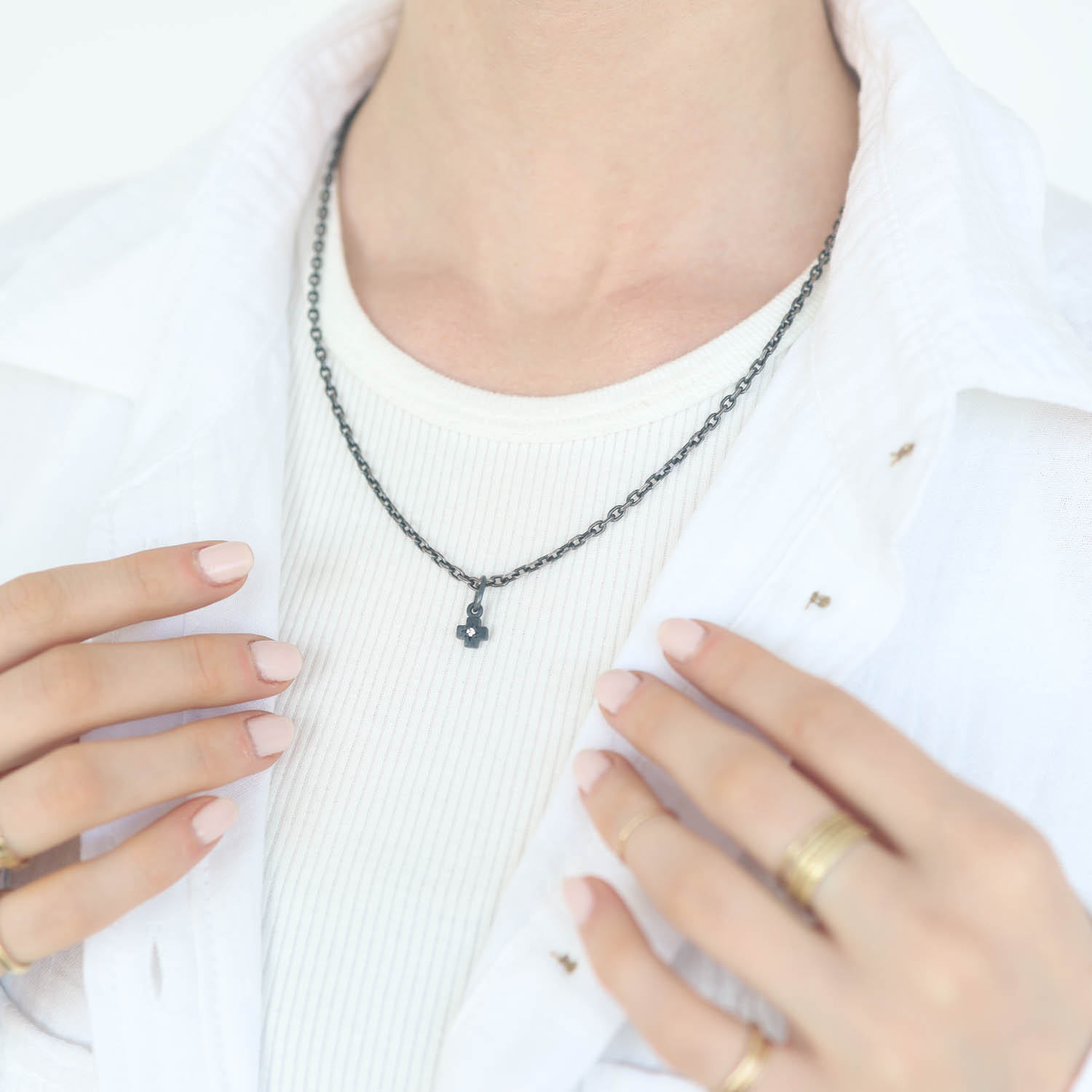Erica Molinari Trunk Show: SS single engraved diamond cross .025 TCW