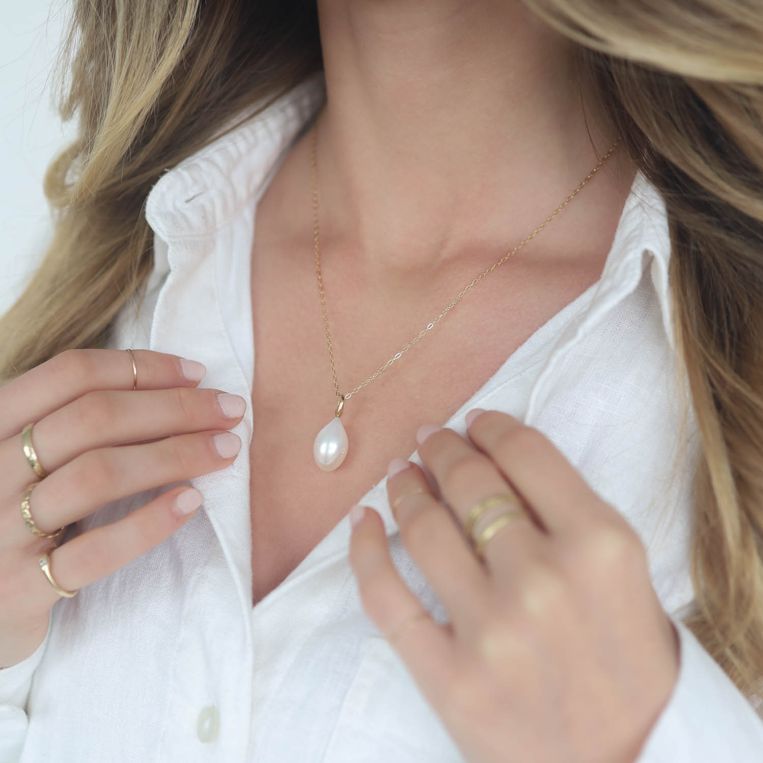 CVC Stones: Drop Shaped White Pearl, Three 0.045ct Small Round Diamonds