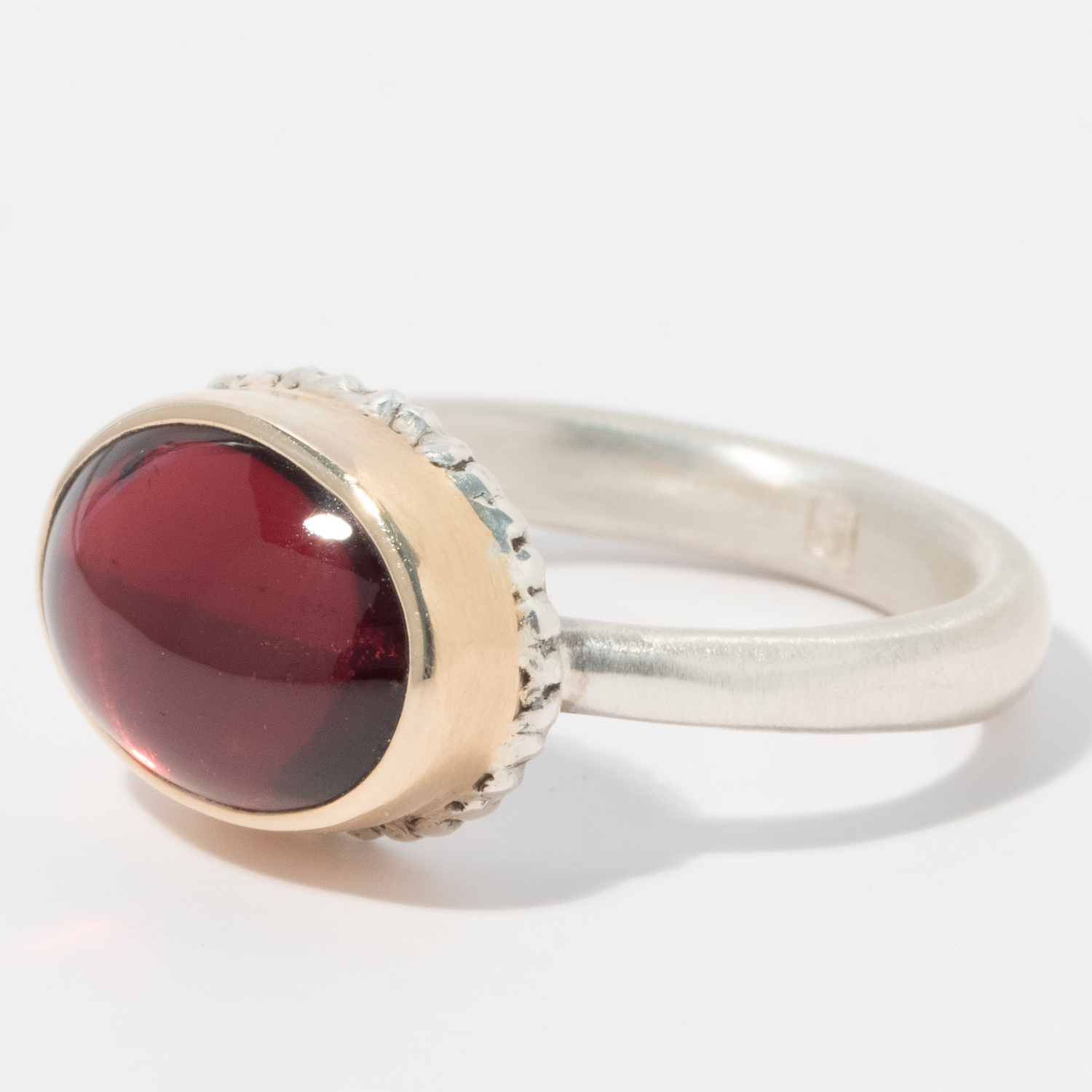 Jamie Joseph: Sterling & 14K Gold Ring w/ Small Oval Smooth GARNET on Lava Platform and Egyptian Band, Size 7 1/4, 5/16" x 1/2"