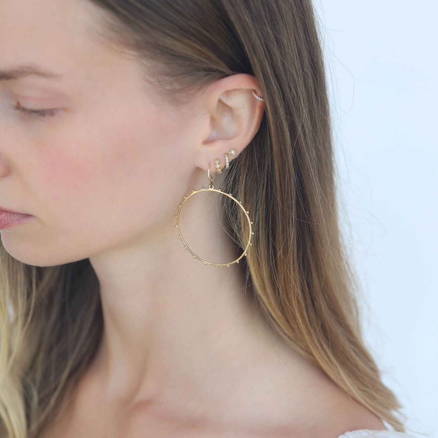 Victoria Cunningham Trunk show: Earrings, Studs, large hoop w/ beaded edge 14K Yellow Gold. 2 1/4" x 1 3/4" including earwire