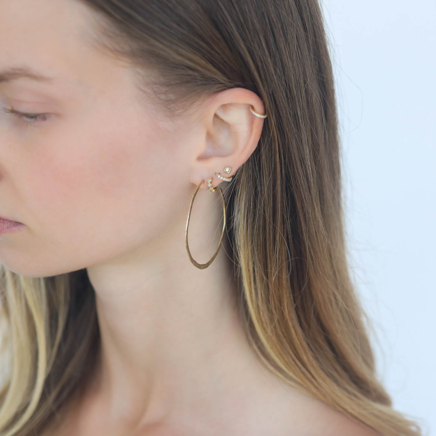 Victoria Cunningham Trunk Show: Earrings, 14k gold Large hammered hoop post, Measure 1 13/16 in diameter
