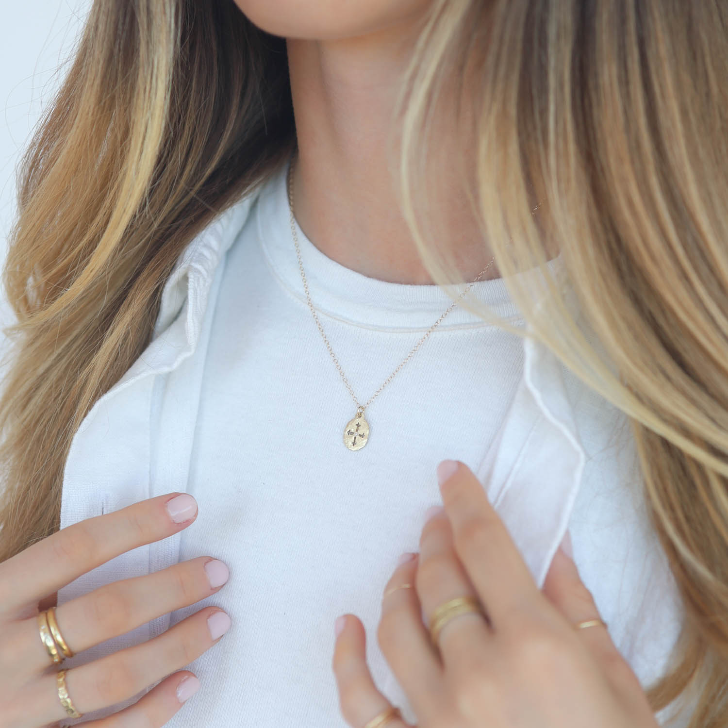 Victoria Cunningham Trunk Show: 14k hammered oval cut out cross