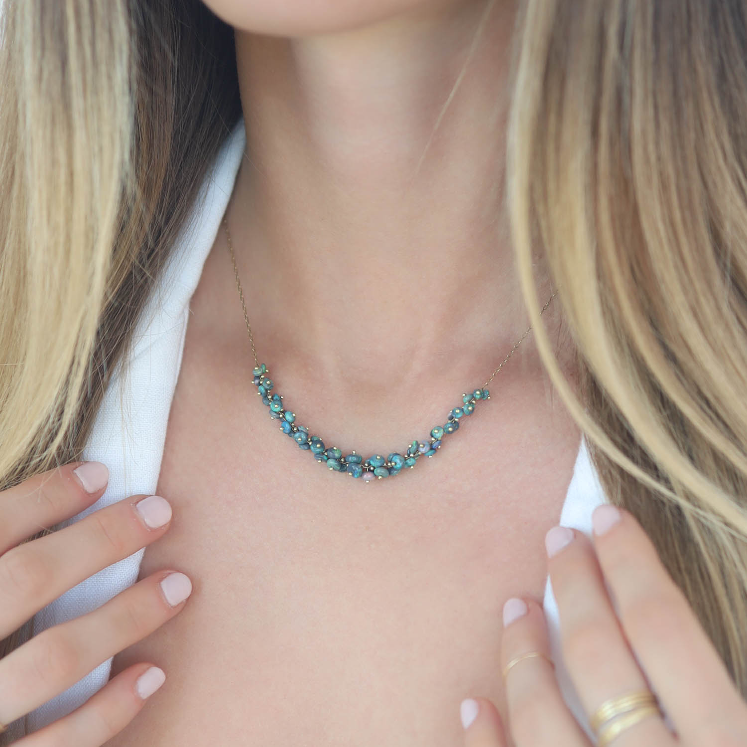 Ten Thousand things: extra-long, center spiral black opal choker on 18k gold
