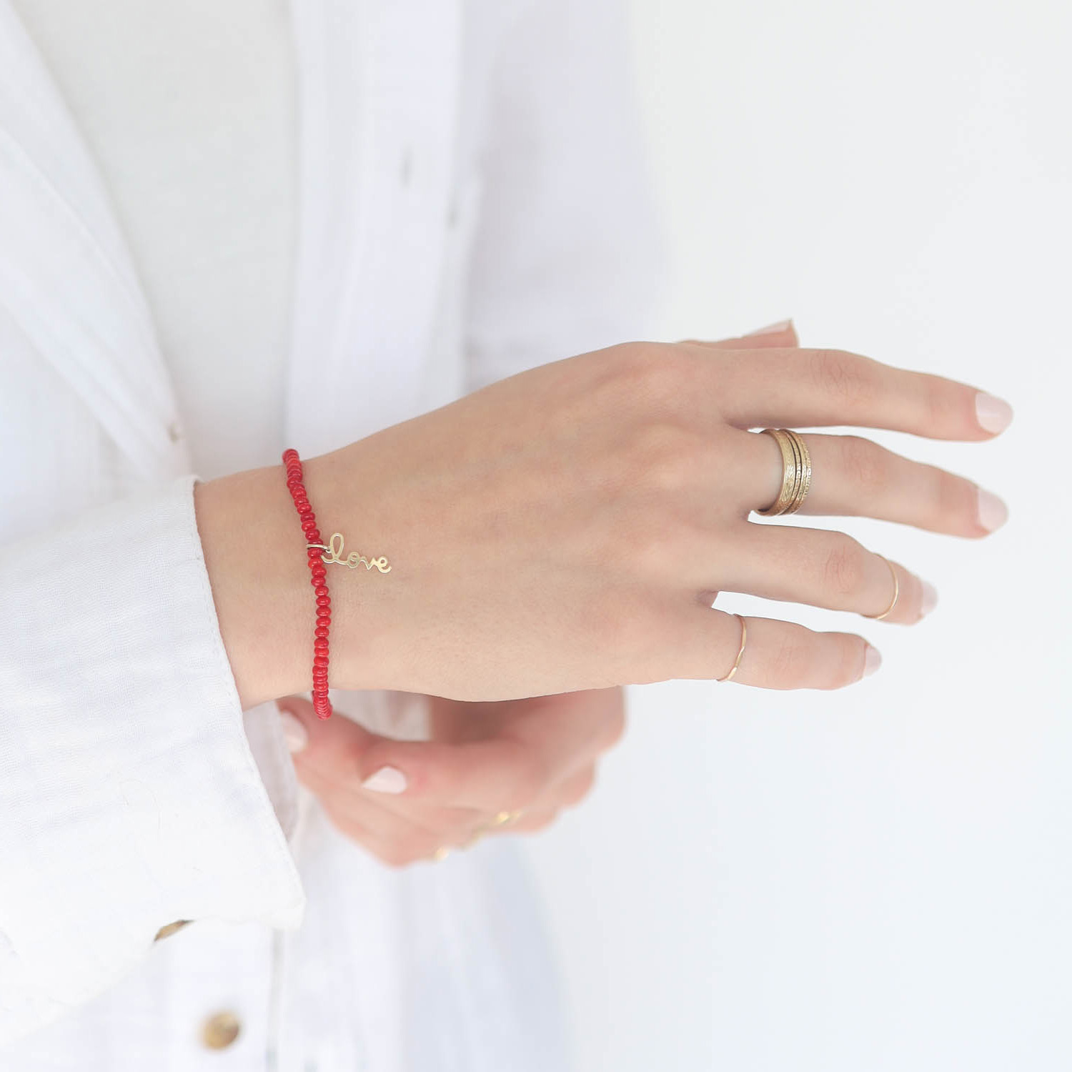 Sydney Evan: Mini Pure Love Script Charm on Red Bamboo Coral Smooth Rondelle