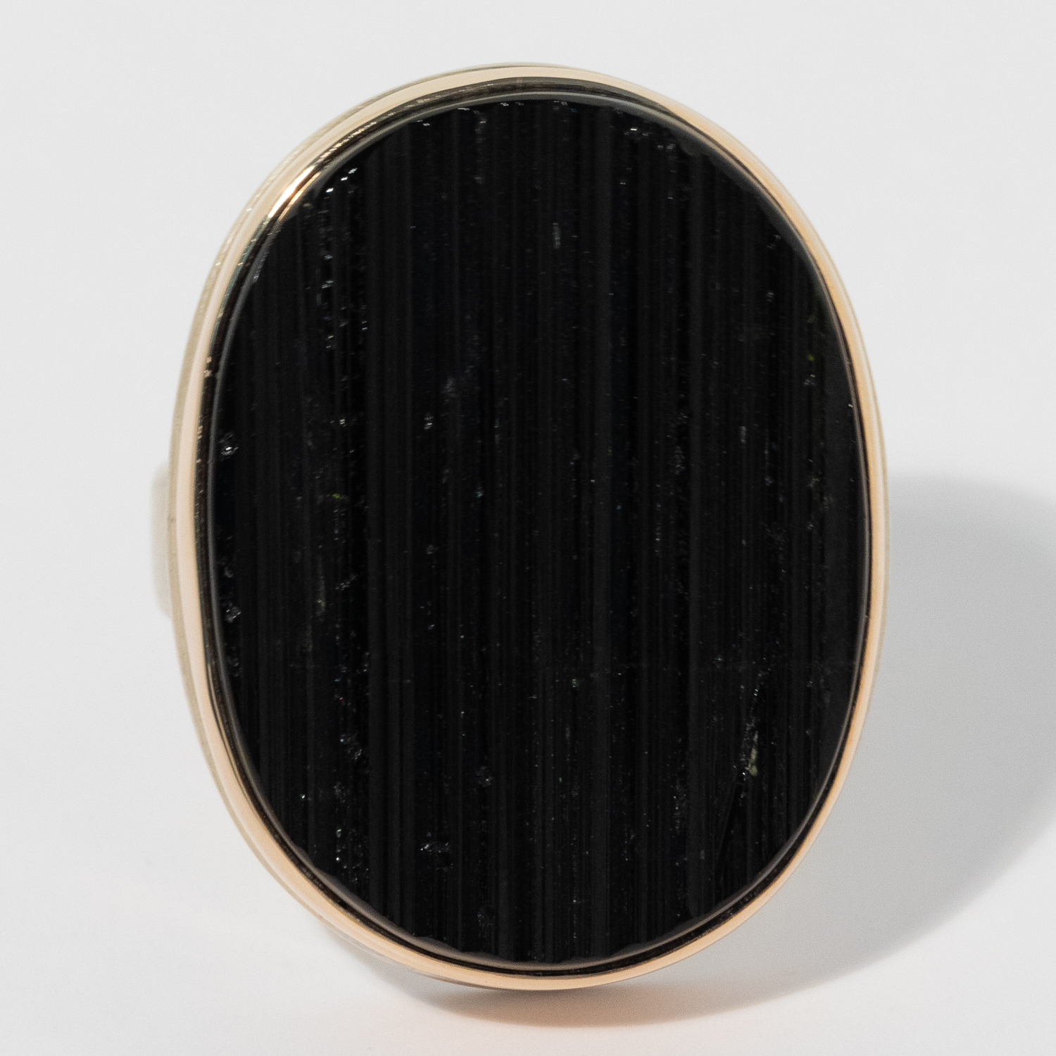 gold and silver ring with black tourmaline by jewelry designer Jamie Joseph